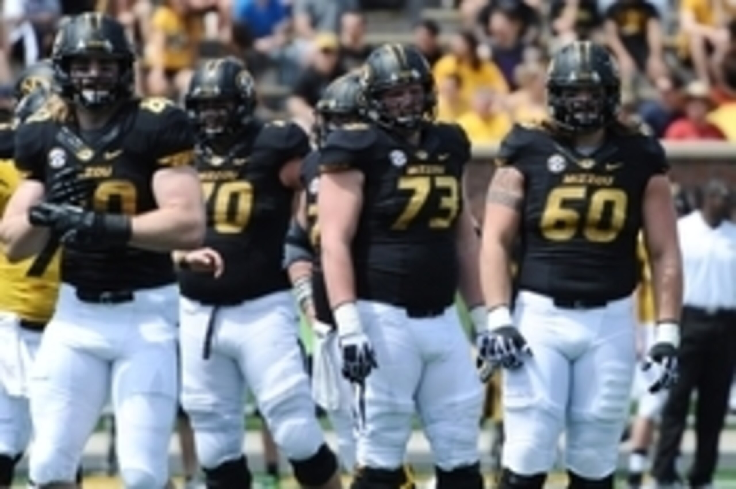 Connor McGovern (60) made the key block on two Missouri touchdowns.