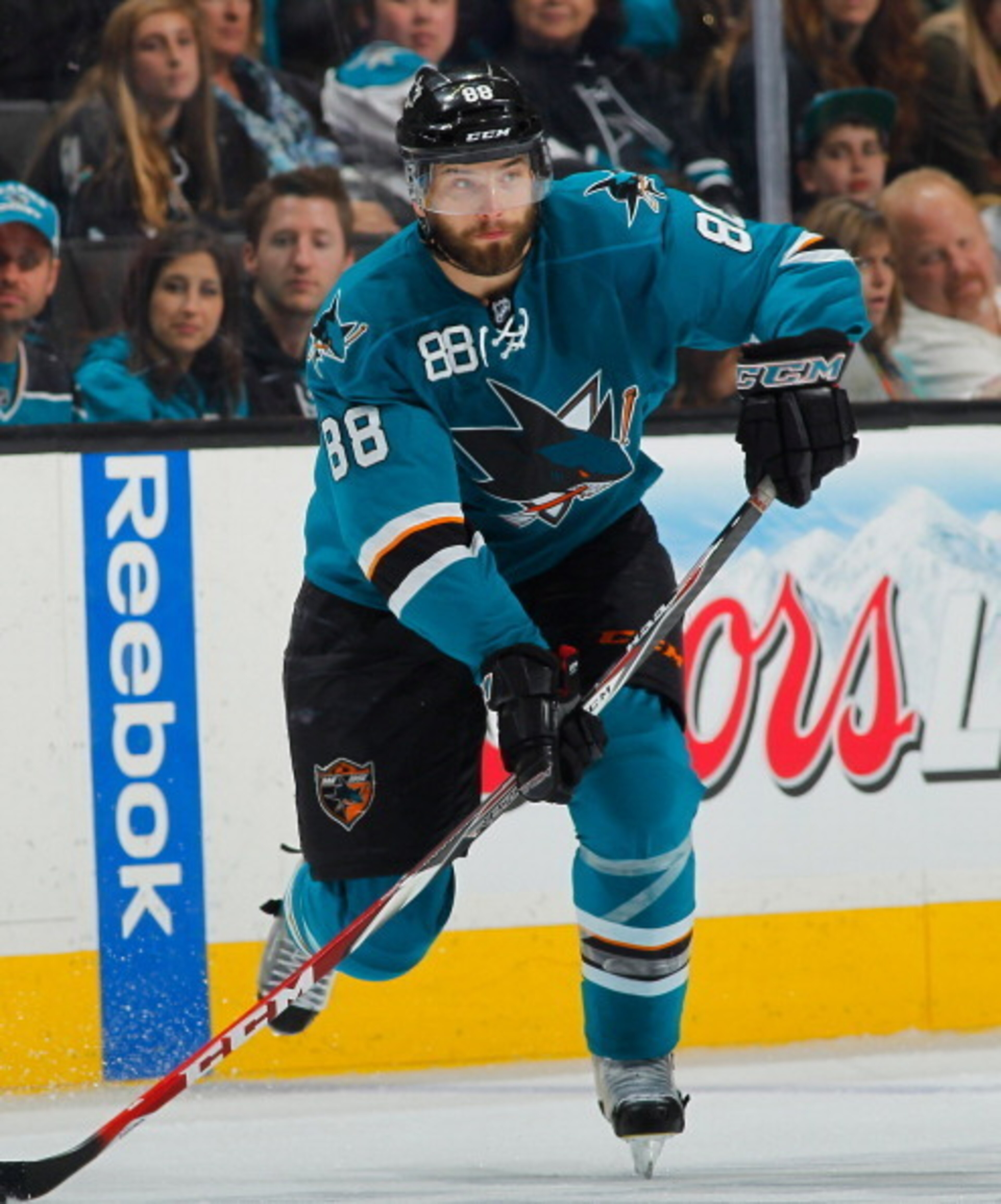 Brent Burns is moving back to defense.