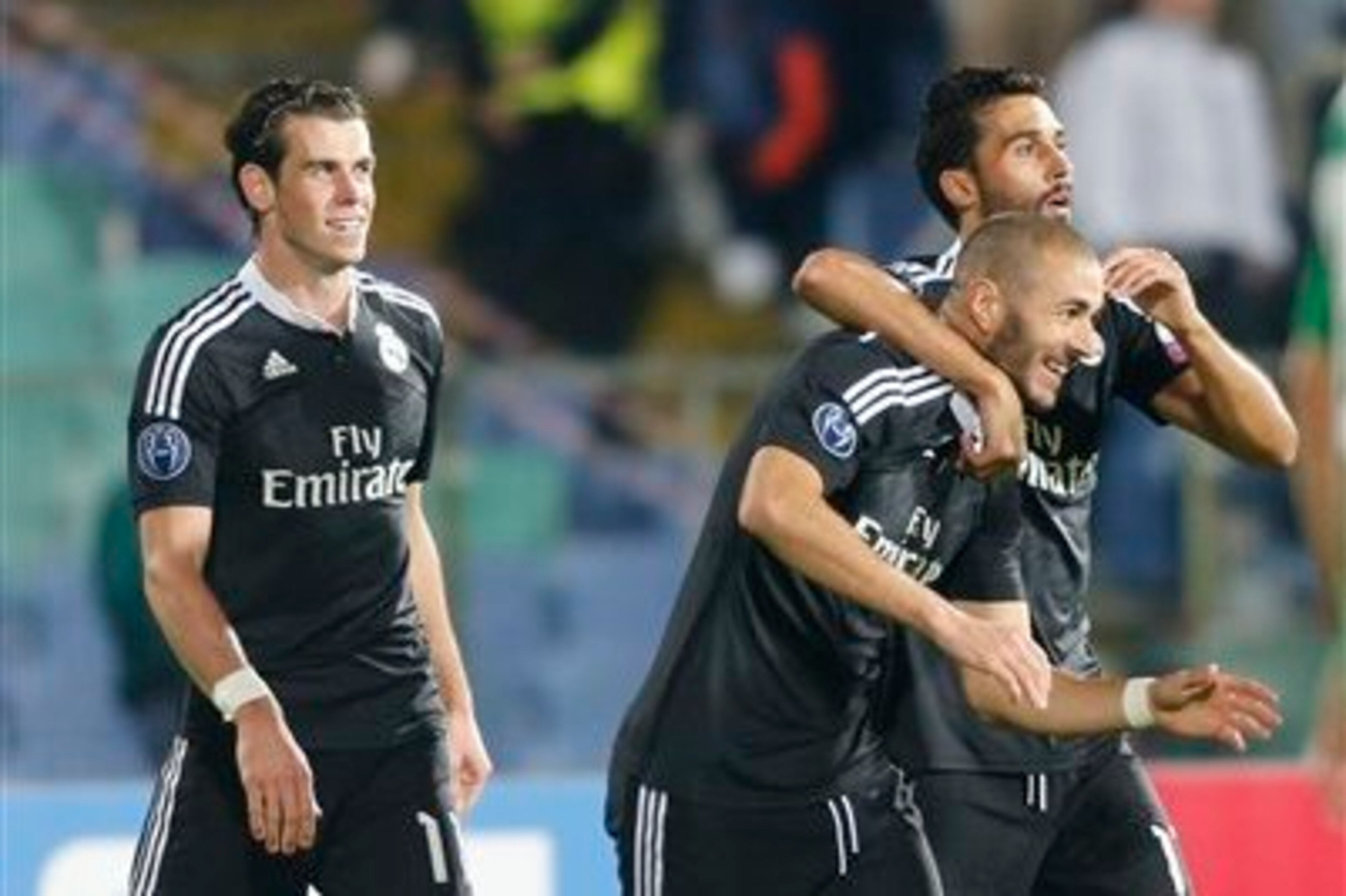 Karim Benzema is congratulated by his team-mates after scoring Real Madrid's winner against Ludogorets.