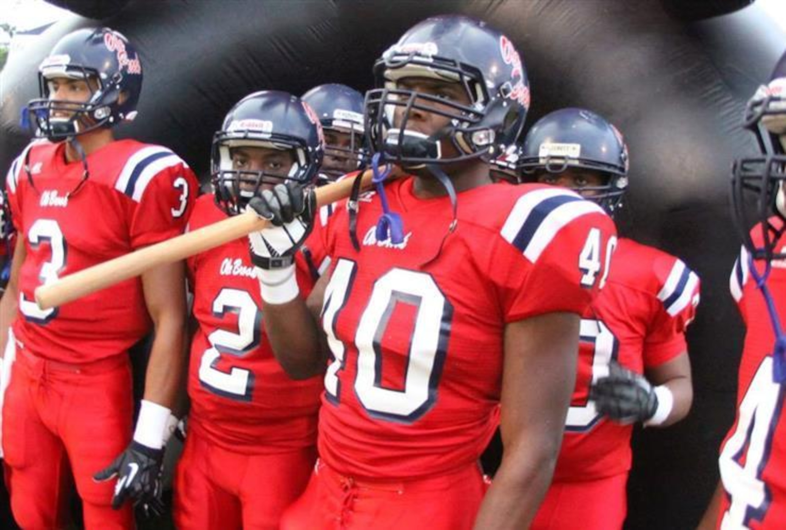 Top-ranked inside linebacker Leo Lewis (40) joined the Rebels.