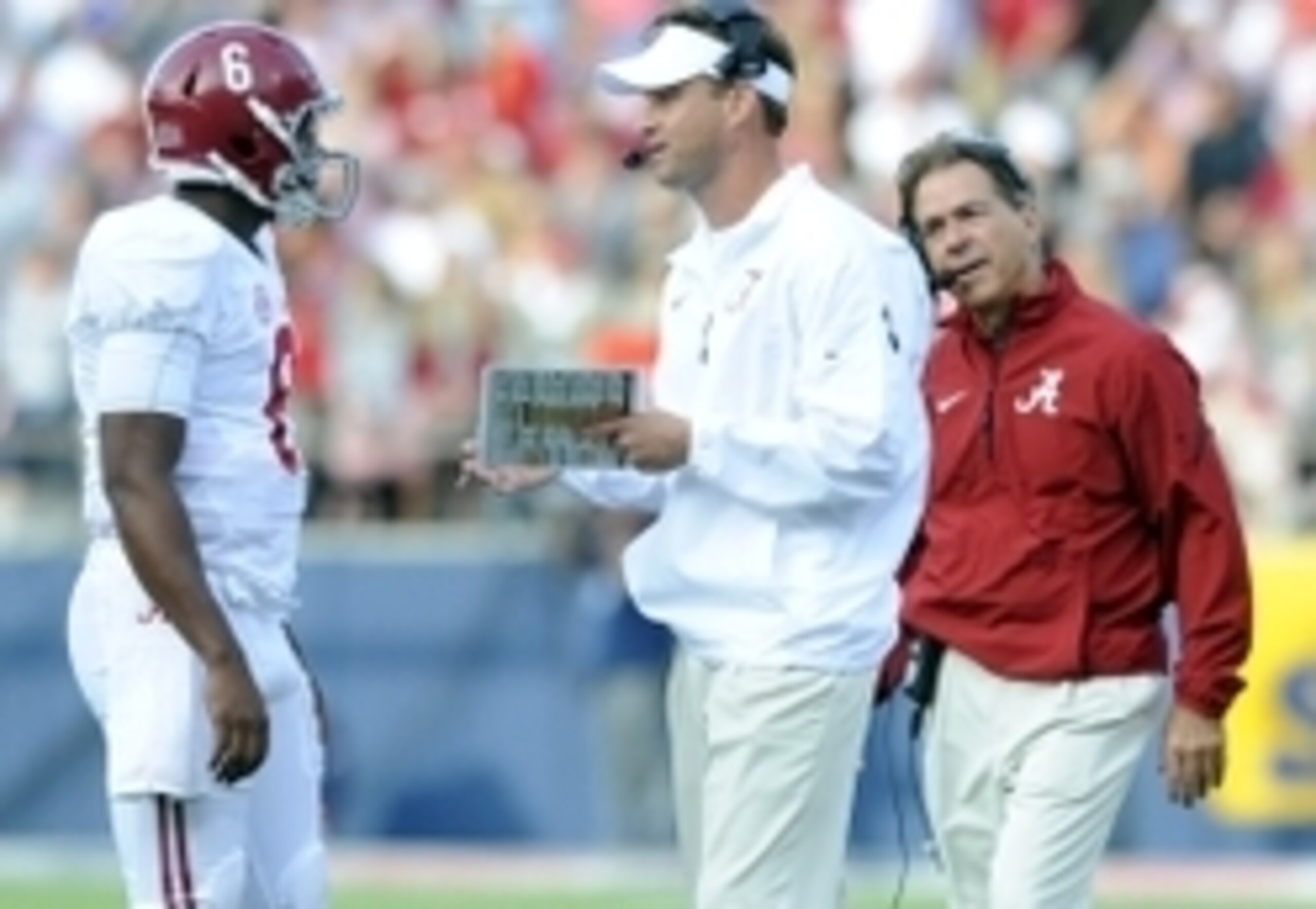 Alabama QB Blake Sims (left), OC Lane Kiffin (center) and head coach Nick Saban (right)