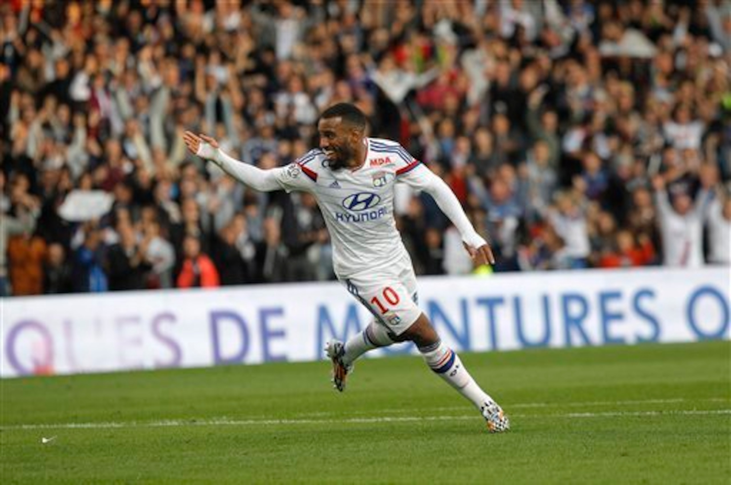 Alexandre Lacazette scored a hat-trick against Lille on Sunday.