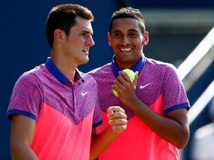 Bernard Tomic and Nick Kyrgios during a doubles match at the 2014 U.S. Open.