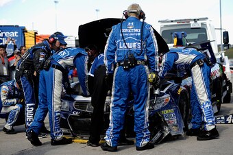 Chad Knaus (left) directs No. 48 crew.