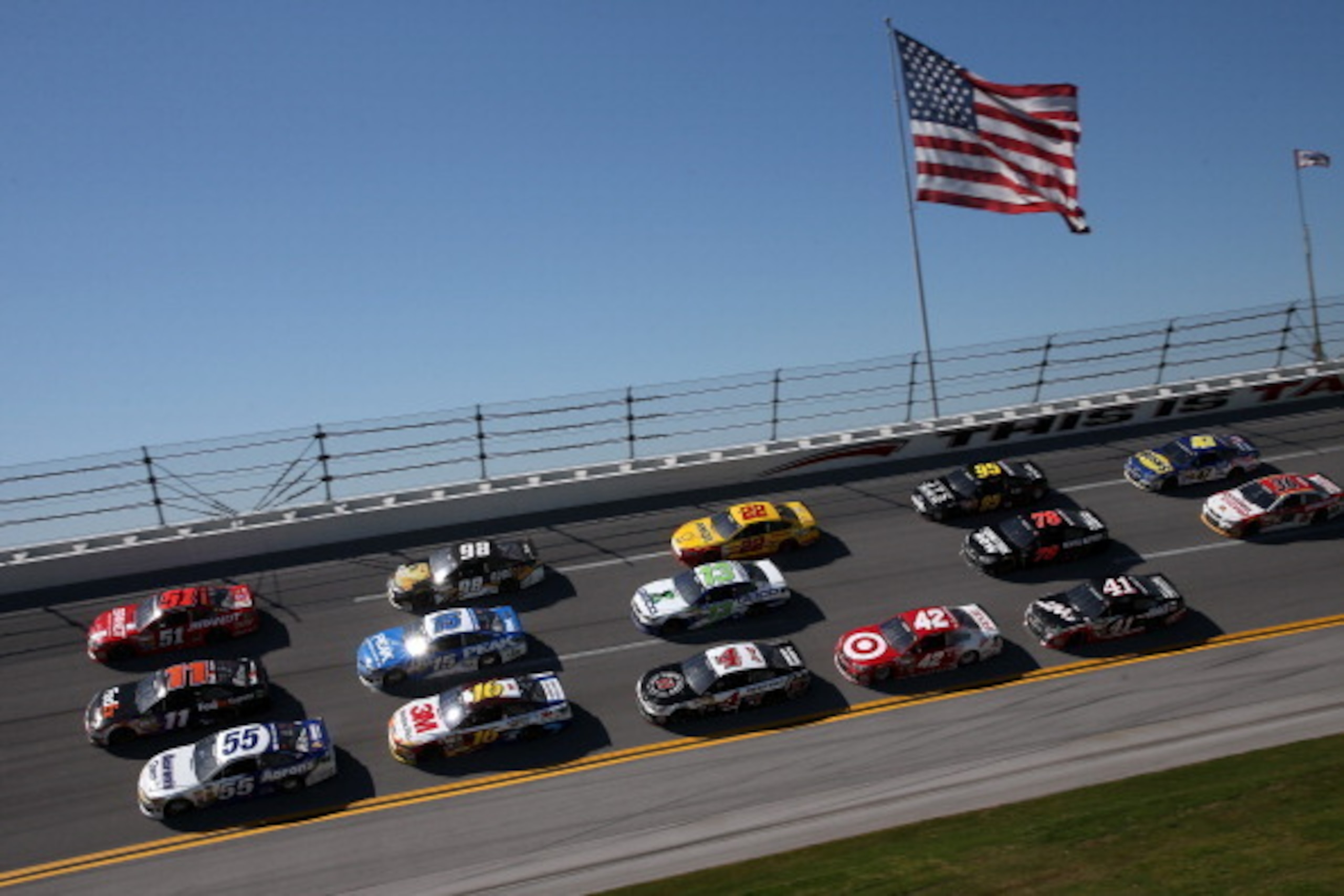 Sprint Cup pack racing at Talladega Superspeedway. Sprint Cup pack racing at Talladega Superspeedway.