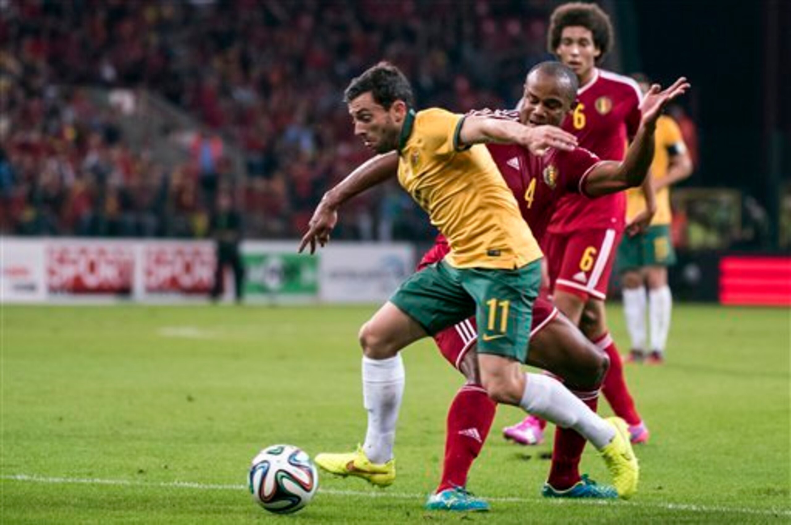 Kompany (4 in red) was overextended on international duty in September. Kompany (4 in red) was overextended on international duty in September.