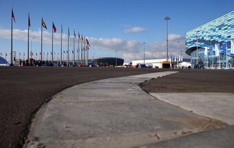 Sochi Autodrom under construction with the Iceberg Skating Palace on the right and other Olympic venues in the background.