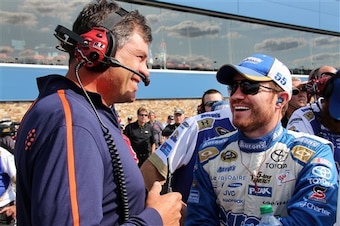 Brian Vickers (right) shares a laugh with team owner Michael Waltrip