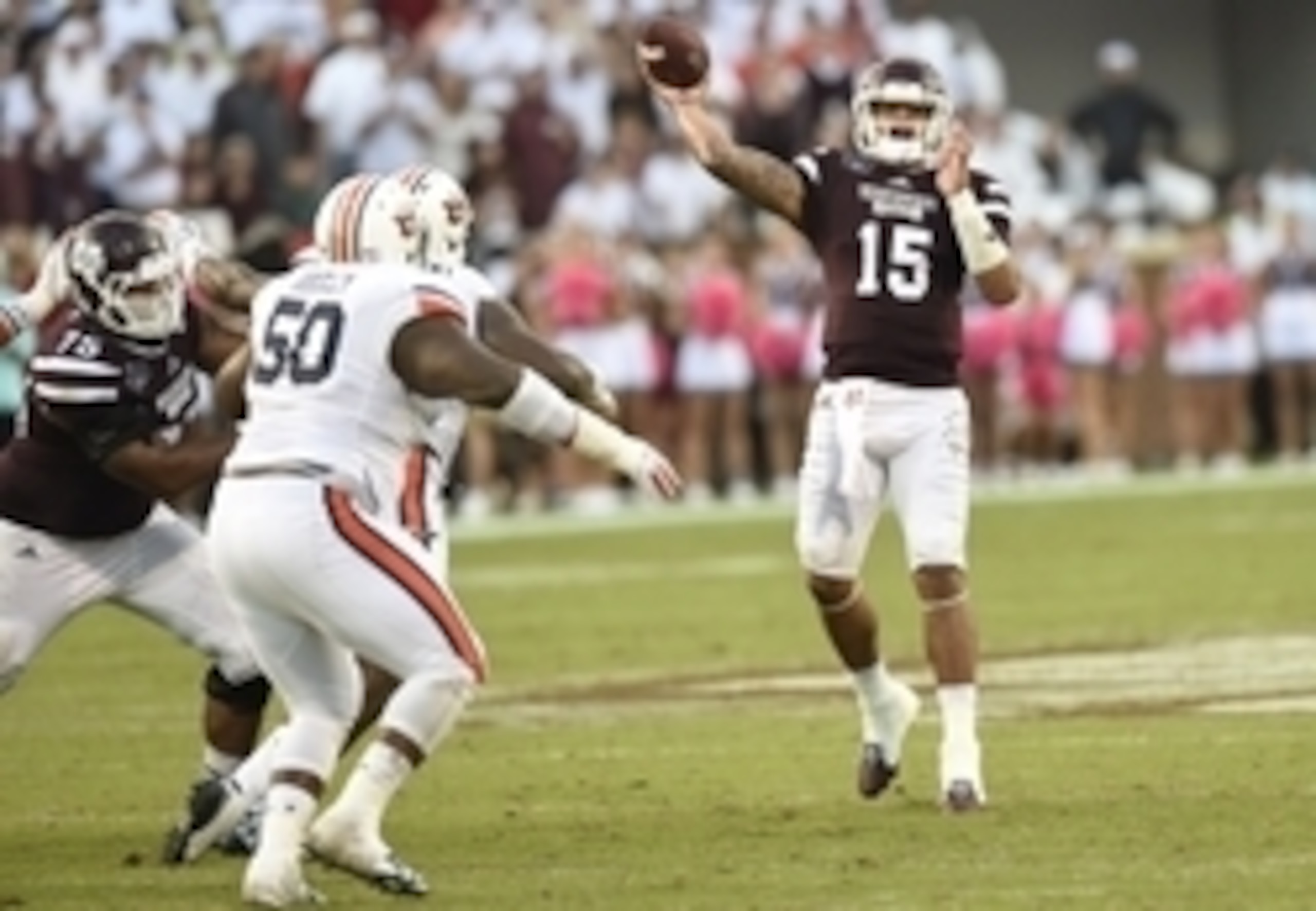 Mississippi State QB Dak Prescott, Auburn DE Gimel President and Auburn DT Ben Bradley