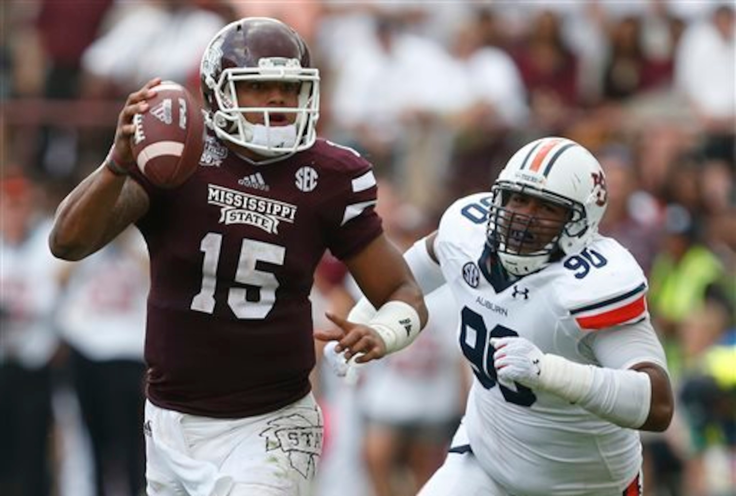 Mississippi State QB Dak Prescott is one of the breakout stories of 2014. Mississippi State QB Dak Prescott is one of the breakout stories of 2014.