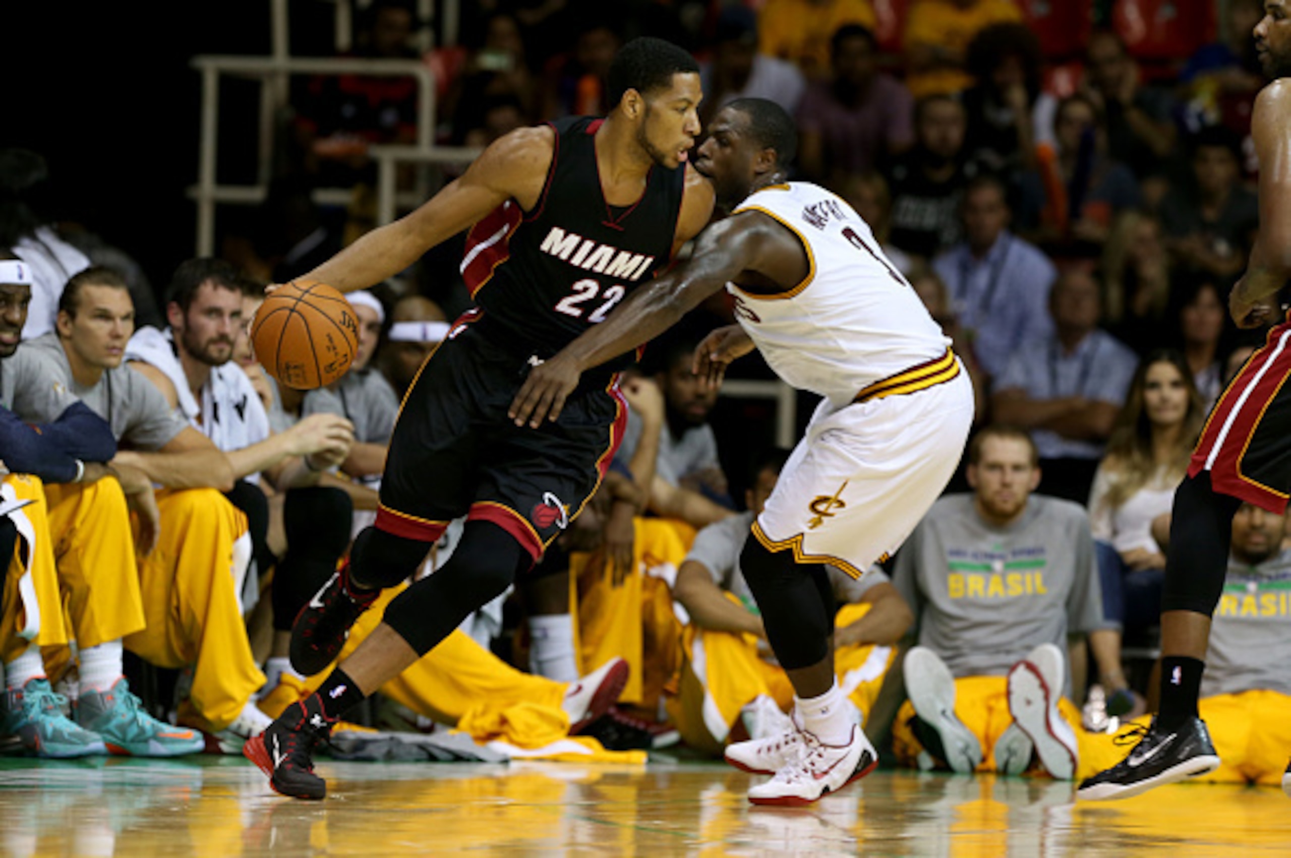 RIO DE JANEIRO, BRAZIL - OCTOBER 11: Danny Granger #22 of the Miami Heat drives to the basket against Dion Waiters #3 of the Cleveland Cavaliers during a game at the HSBC Arena as a part of NBA Global Games on October 11, 2014 in Rio de Janeiro, Brazil.  