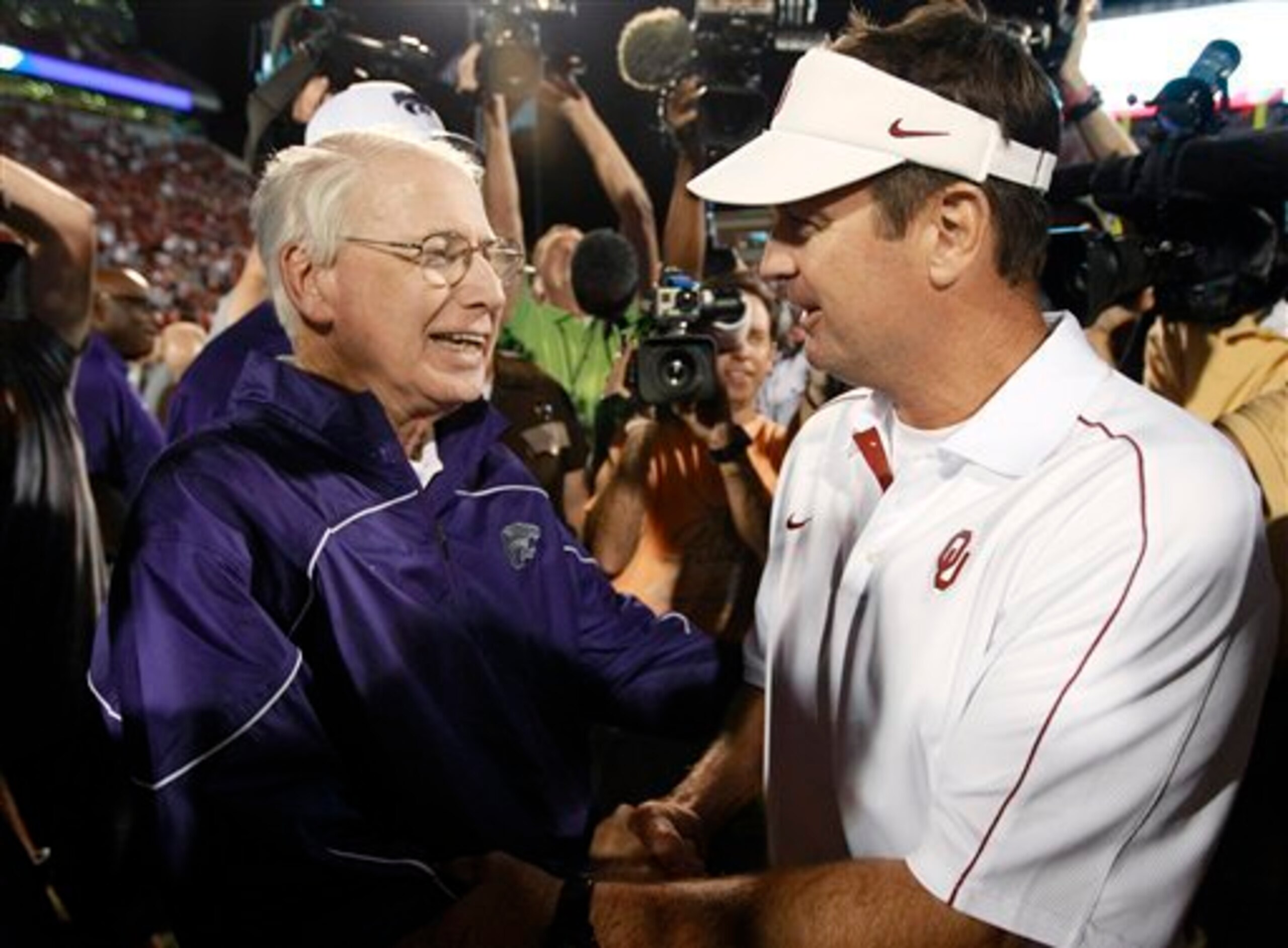 Snyder (left) and Stoops (right) meet again.