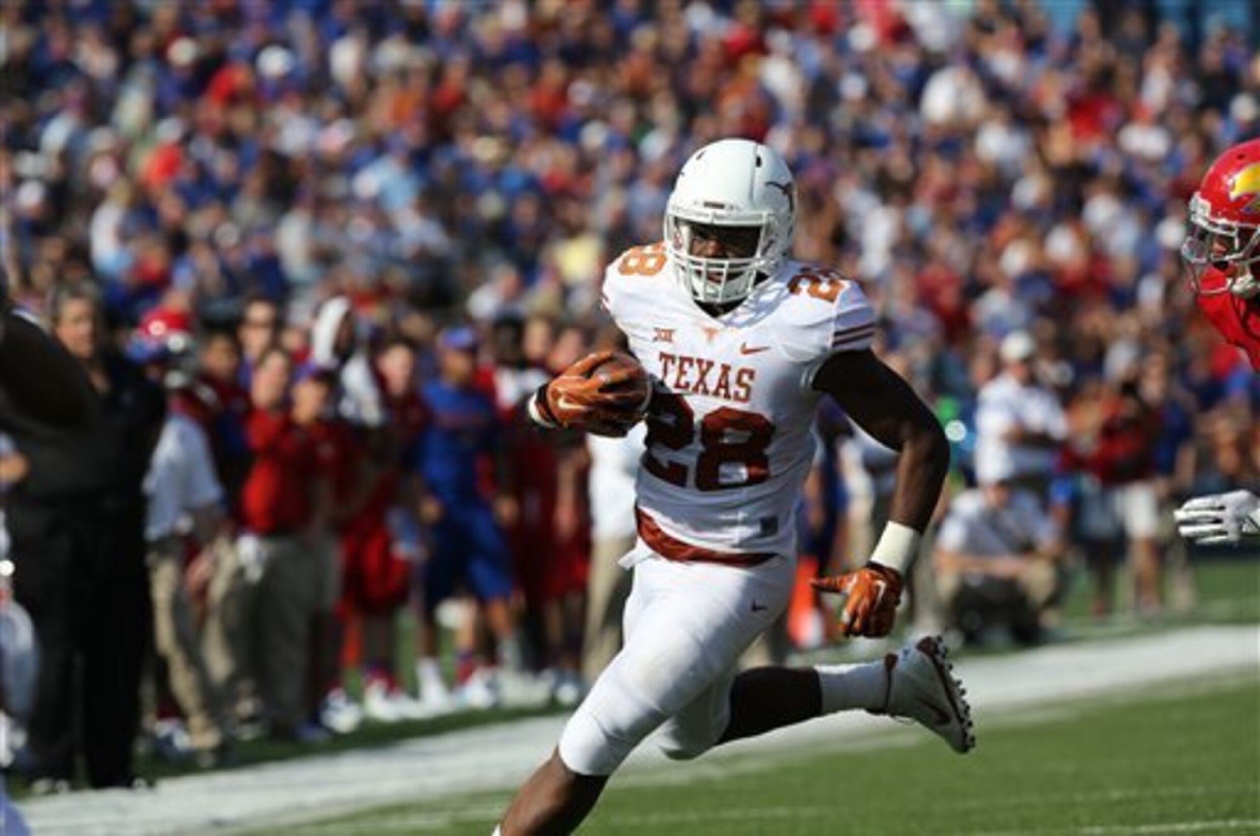 Malcolm Brown leads Texas' pedestrian rushing attack.