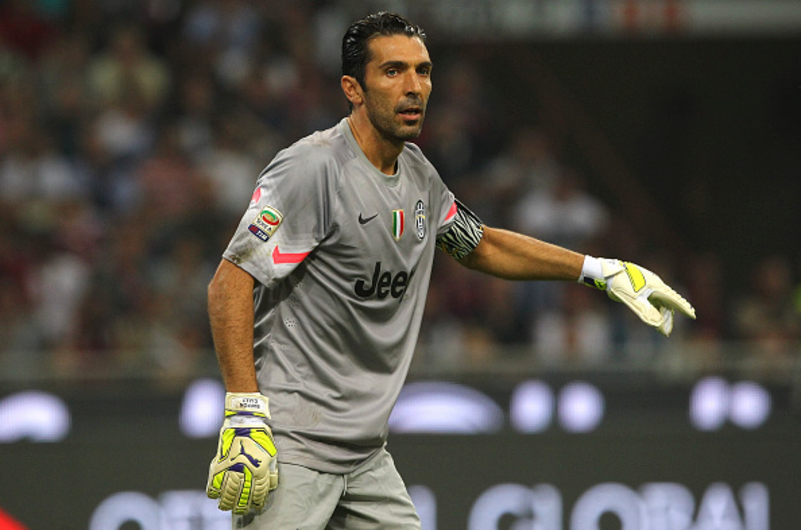 MILAN, ITALY - SEPTEMBER 20:  Gianluigi Buffon of Juventus FC looks on during the Serie A match between AC Milan and Juventus FC at Stadio Giuseppe Meazza on September 20, 2014 in Milan, Italy.  (Photo by Marco Luzzani/Getty Images)