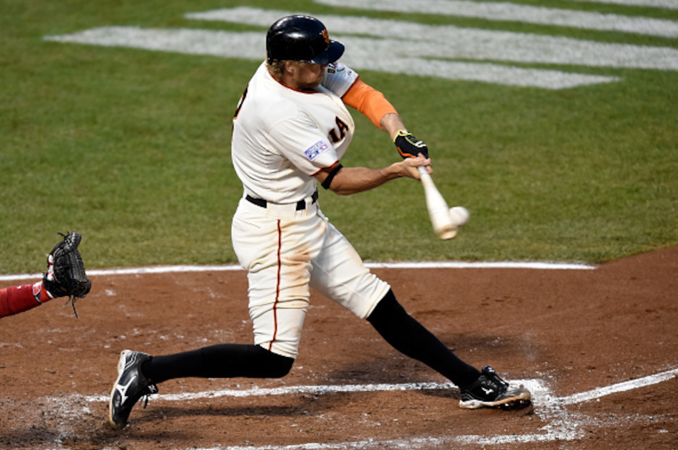 SAN FRANCISCO, CA - OCTOBER 15:  Hunter Pence #8 of the San Francisco Giants hits a RBI single in the third inning against the St. Louis Cardinals during Game Four of the National League Championship Series at AT&T Park on October 15, 2014 in San Francisc
