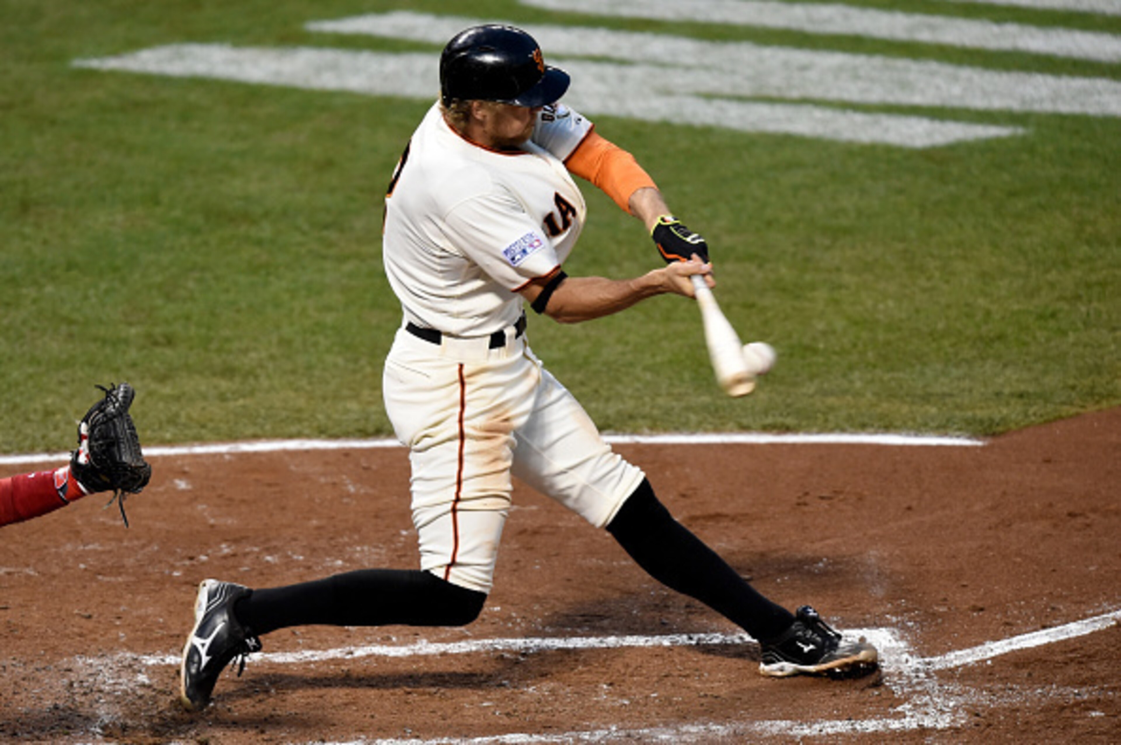 SAN FRANCISCO, CA - OCTOBER 15:  Hunter Pence #8 of the San Francisco Giants hits a RBI single in the third inning against the St. Louis Cardinals during Game Four of the National League Championship Series at AT&T Park on October 15, 2014 in San Francisc
