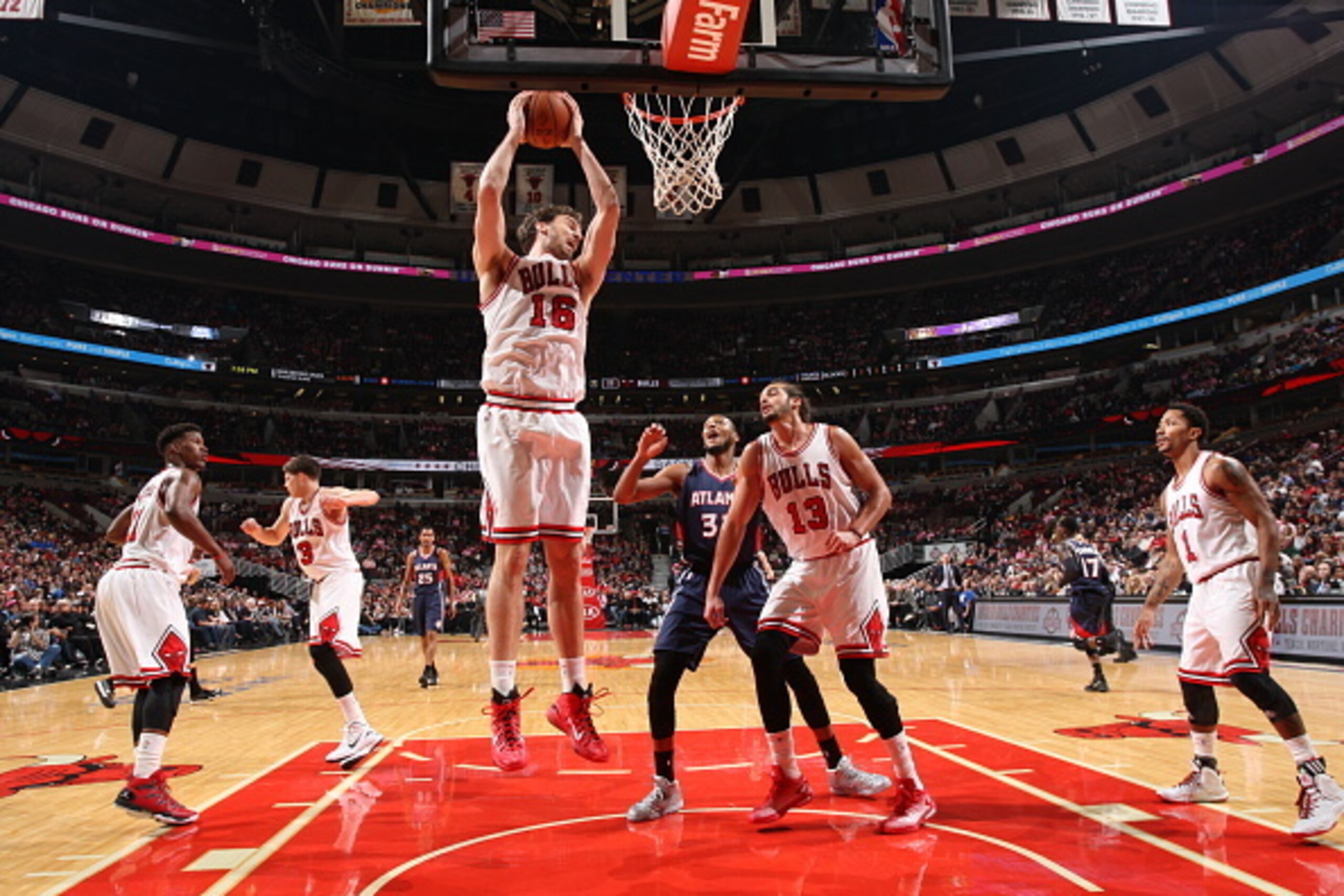 Pau Gasol secures a rebound.