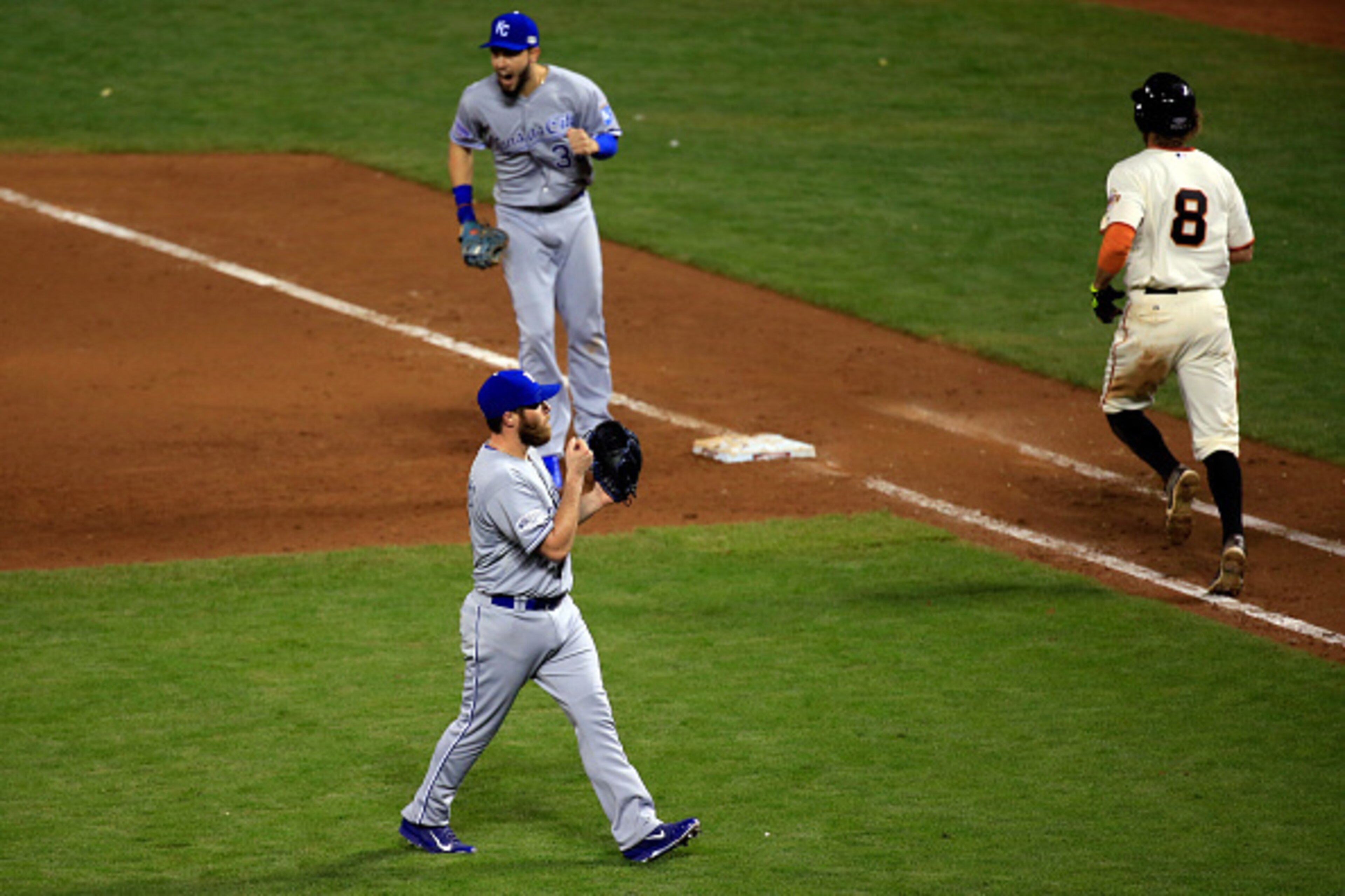 Greg Holland (forefront) closed out the Royals' Game 3 win in San Francisco to put them up 2-1 in the World Series.