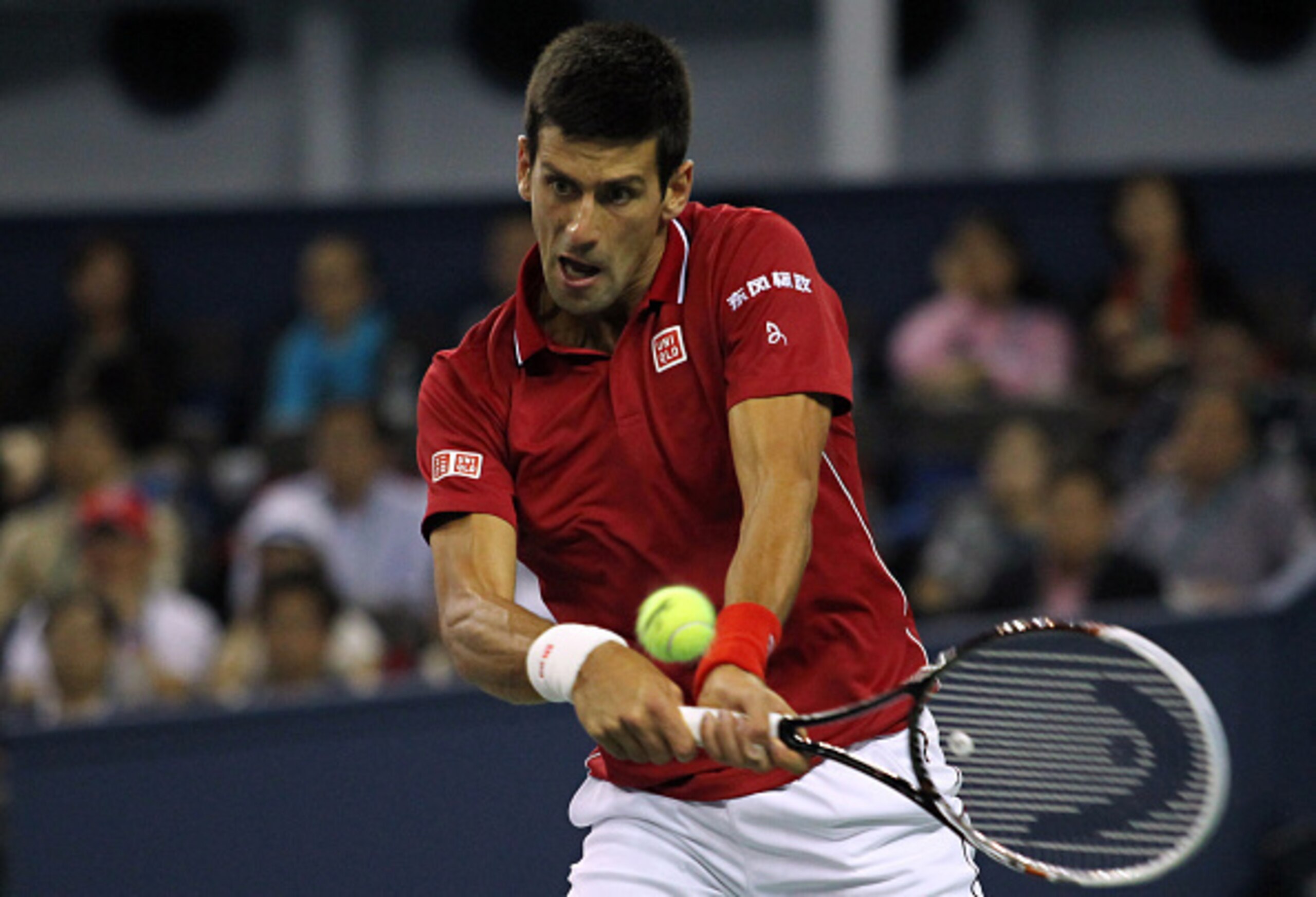 Novak Djokovic hits a backhand during a match in Shanghai. Novak Djokovic hits a backhand during a match in Shanghai.