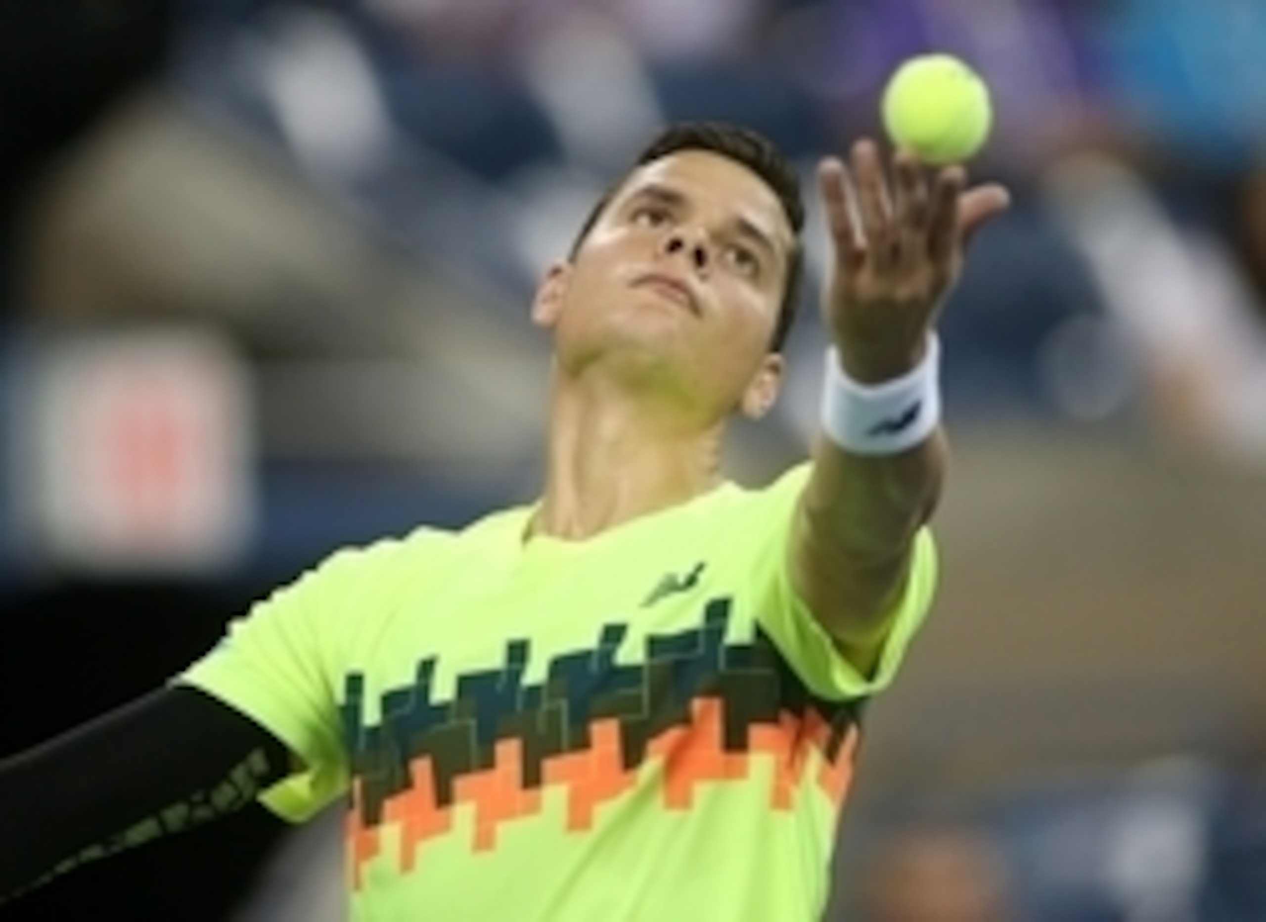 Milos Raonic gets set to serve during U.S. Open. Milos Raonic gets set to serve during U.S. Open.