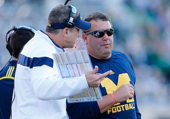 Offensive coordinator Doug Nussmeier and Brady Hoke