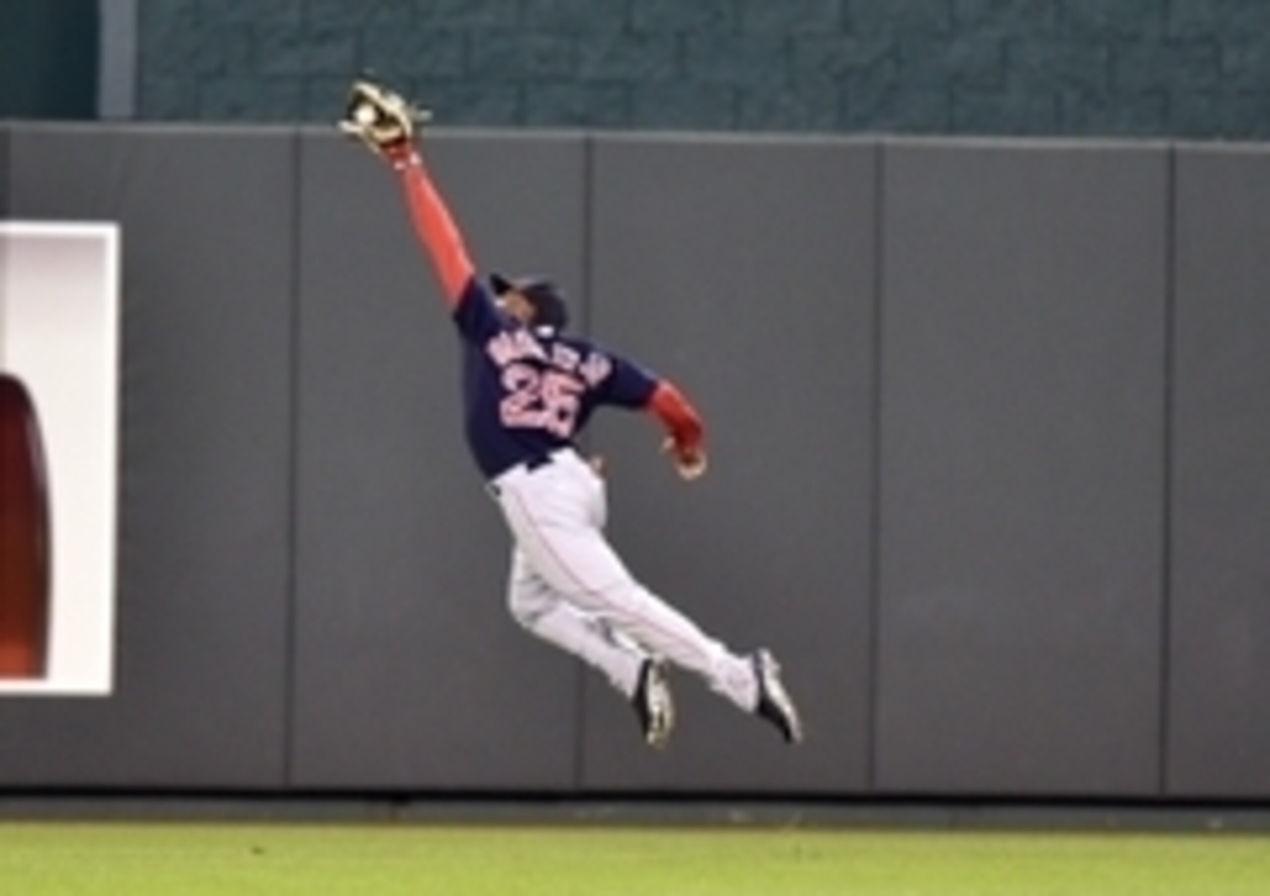 Sep 12, 2014; Kansas City, MO, USA; Boston Red Sox center fielder Jackie Bradley Jr. (25) makes a diving catch for the final out of the game against the Kansas City Royals during the ninth inning at Kauffman Stadium. Boston won 4-2. Mandatory Credit: Pete