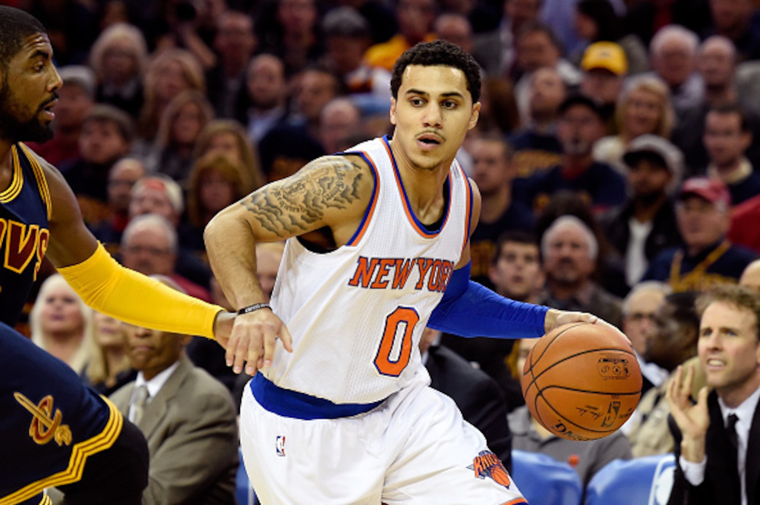 CLEVELAND, OH - OCTOBER 30: Shane Larkin #0 of the New York Knicks controls the ball in the first quarter against the Cleveland Cavaliers at Quicken Loans Arena on October 30, 2014 in Cleveland, Ohio. NOTE TO USER: User expressly acknowledges and agrees t CLEVELAND, OH - OCTOBER 30: Shane Larkin #0 of the New York Knicks controls the ball in the first quarter against the Cleveland Cavaliers at Quicken Loans Arena on October 30, 2014 in Cleveland, Ohio. NOTE TO USER: User expressly acknowledges and agrees t