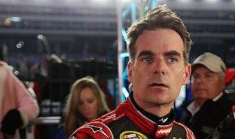 FORT WORTH, TX - NOVEMBER 02:  Jeff Gordon, driver of the #24 Drive To End Hunger Chevrolet, reacts after being involved in a fight with Brad Keselowski, driver of the #2 Miller Lite Ford, at the conclusion of the NASCAR Sprint Cup Series AAA Texas 500 at
