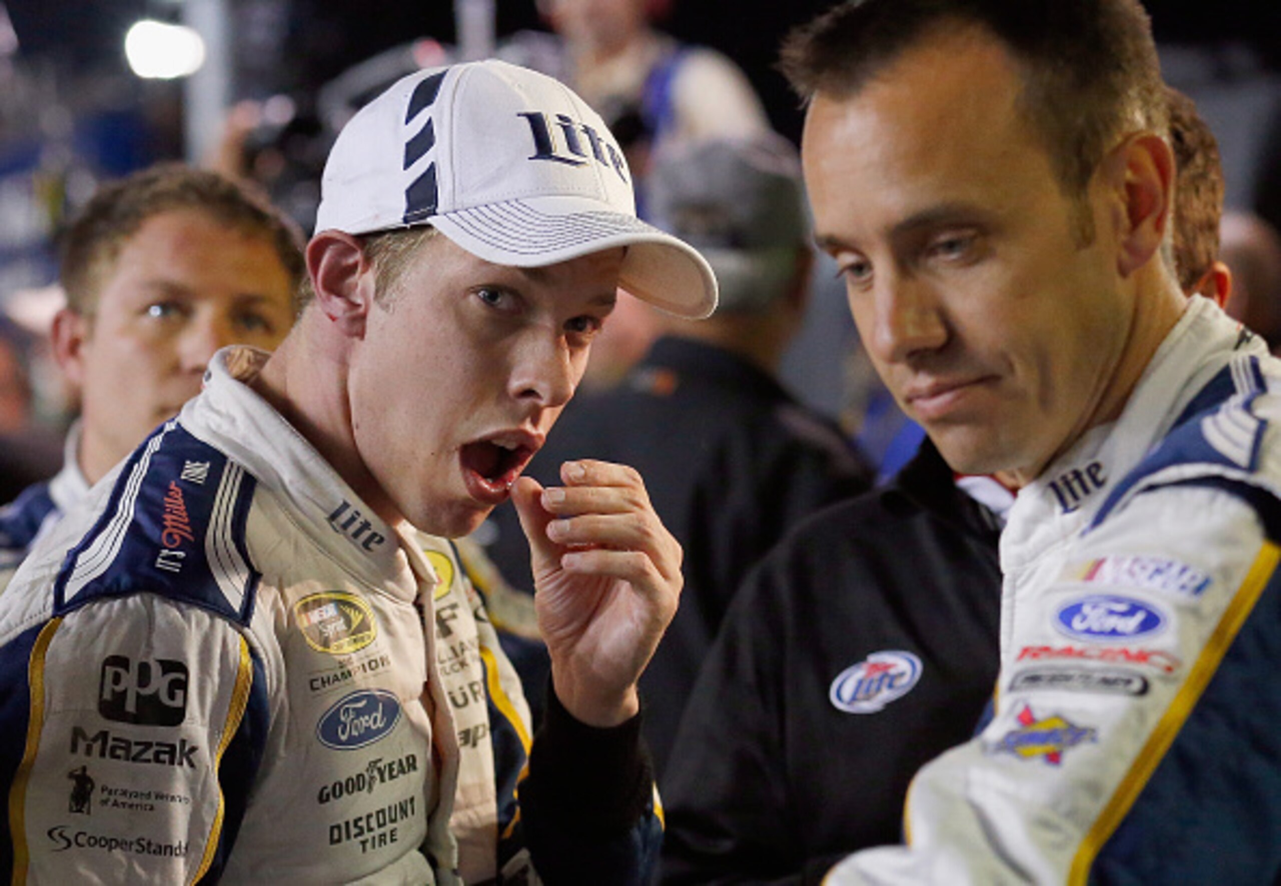 The aftermath of The Brawl at Texas Motor Speedway; Brad Keselowski (left) with crew chief Paul Wolfe