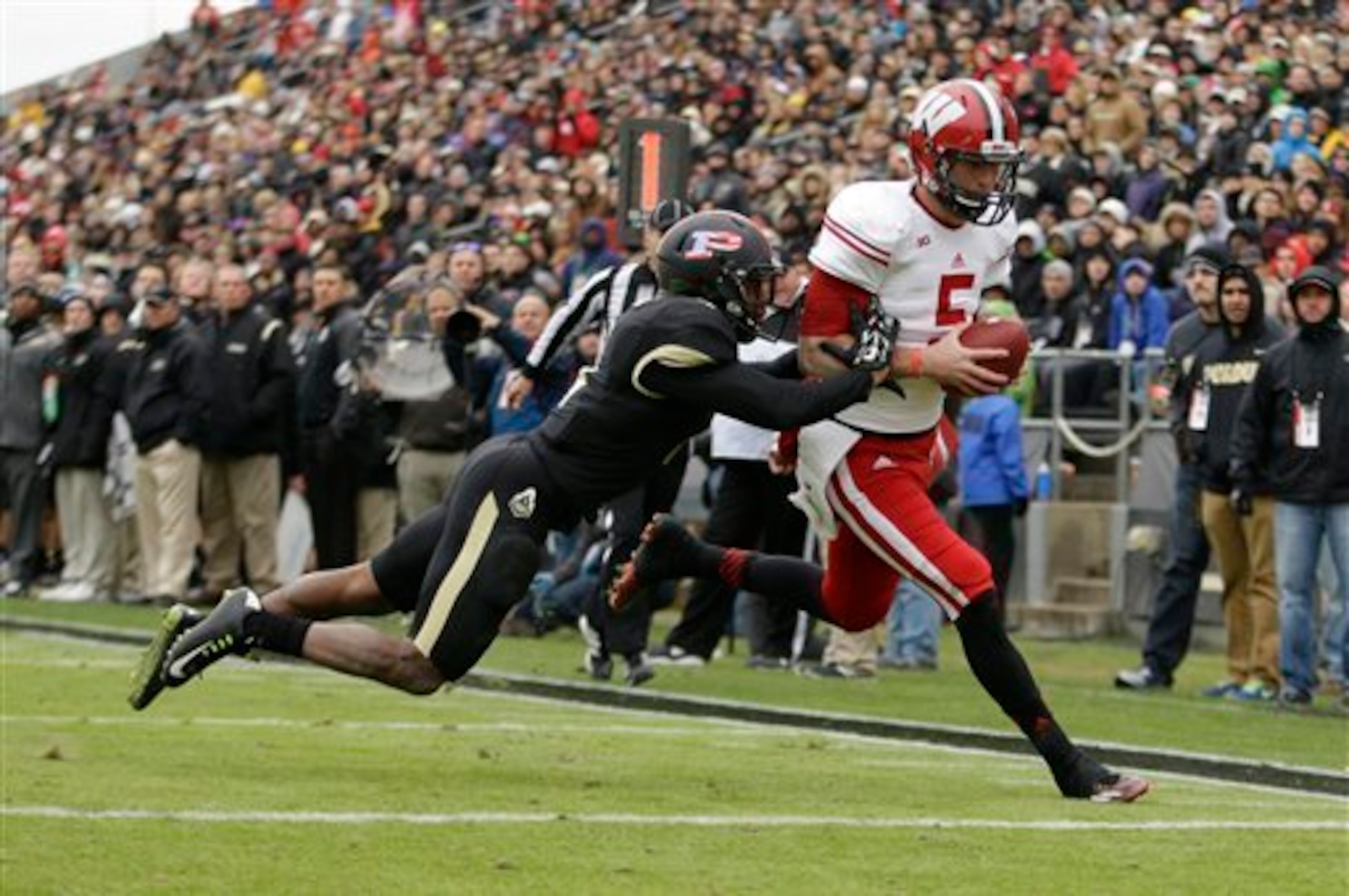 Tanner McEvoy's ability to run the ball in the zone read creates a matchup nightmare in the second level.