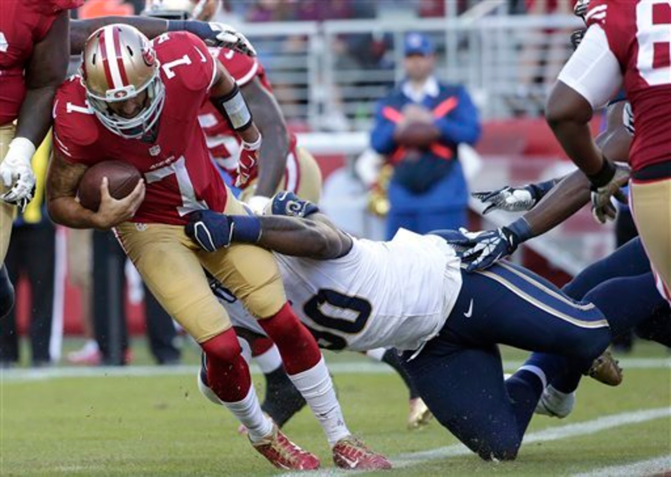 Michael Brockers (90) sacks Colin Kaepernick (7).