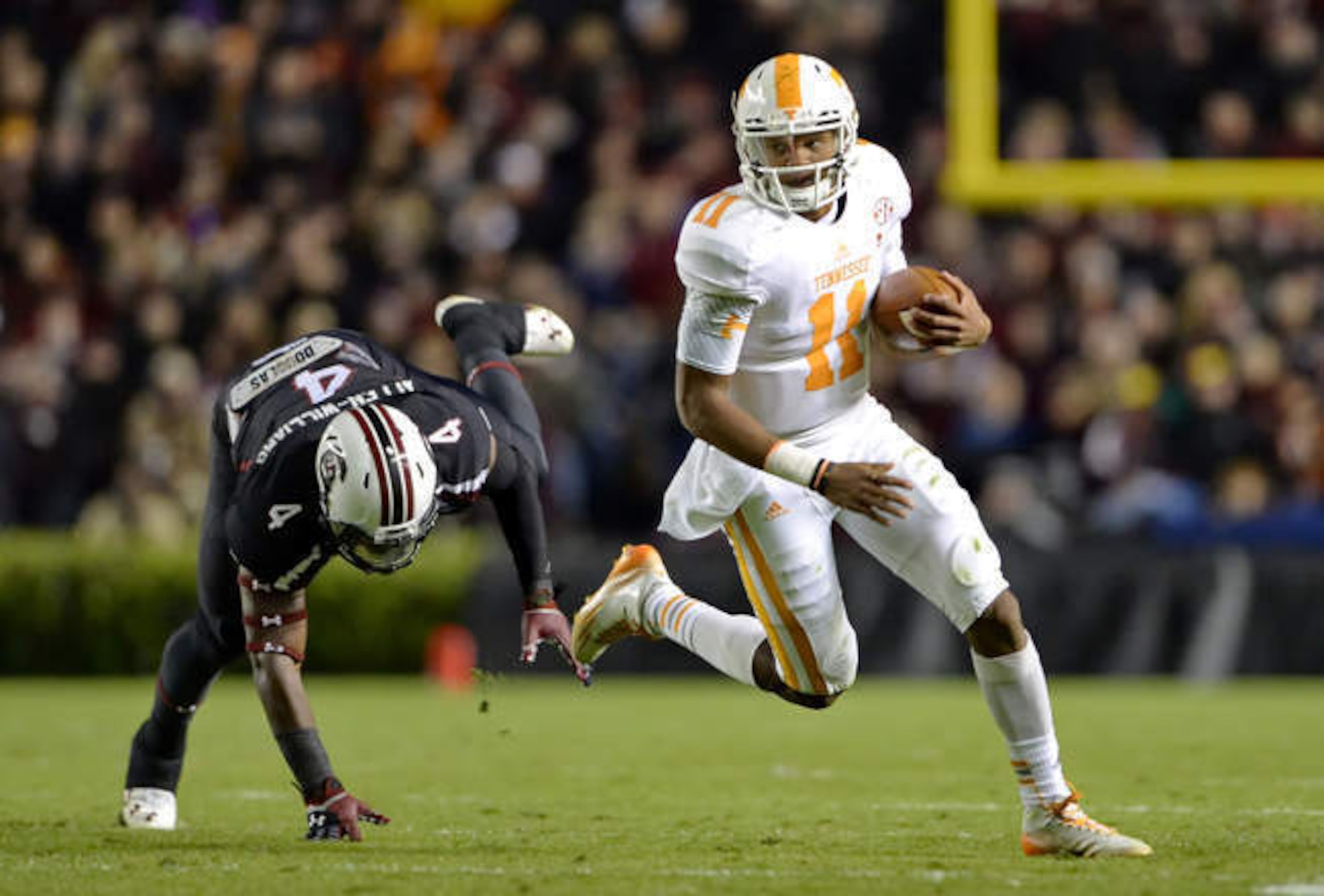 The Vols discovered a playmaker in Dobbs (right).