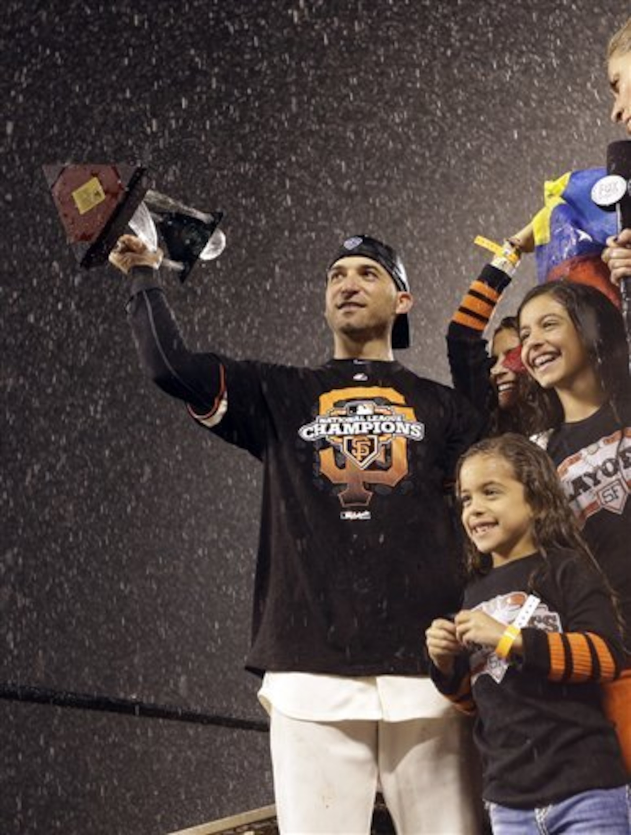 Scutaro hoisted the NLCS MVP three months after being traded to the Giants for infielder Charlie Culberson.
