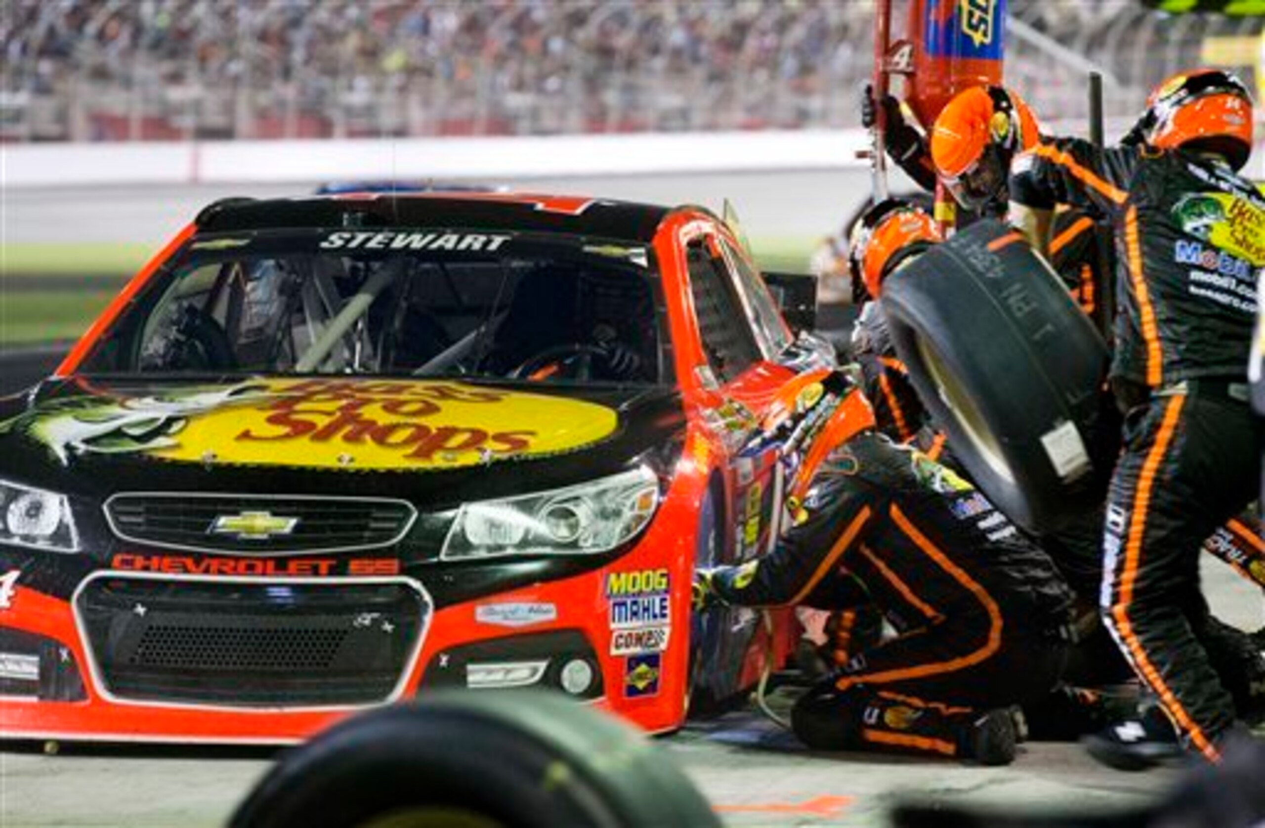 This crew, shown working on Tony Stewart's car at Atlanta on Aug. 31, now services Kevin Harvick's car.