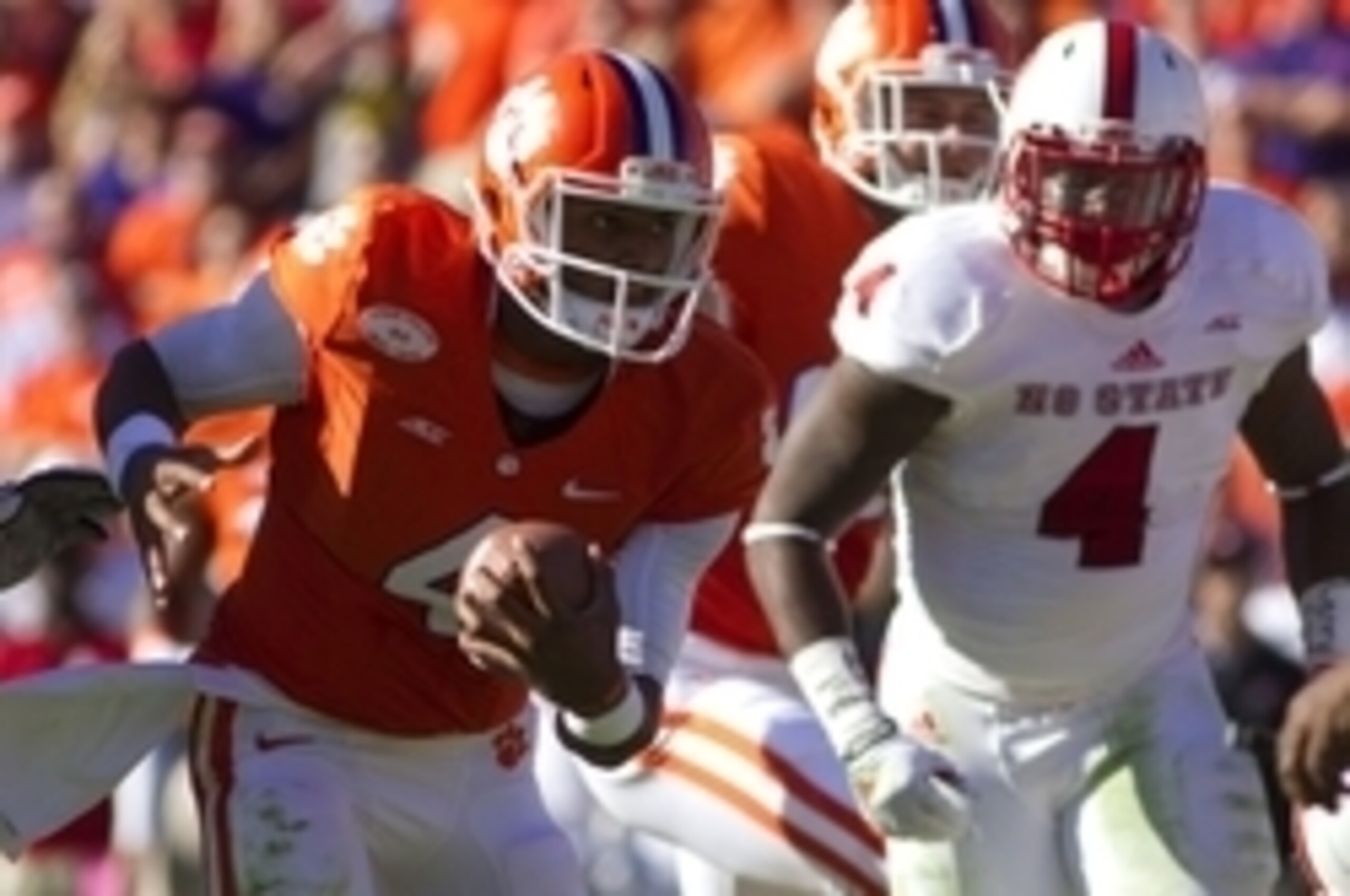 Oct 4, 2014; Clemson, SC, USA; Clemson Tigers quarterback Deshaun Watson (4) carries the ball during the second quarter against the North Carolina State Wolfpack at Clemson Memorial Stadium. Mandatory Credit: Joshua S. Kelly-USA TODAY Sports