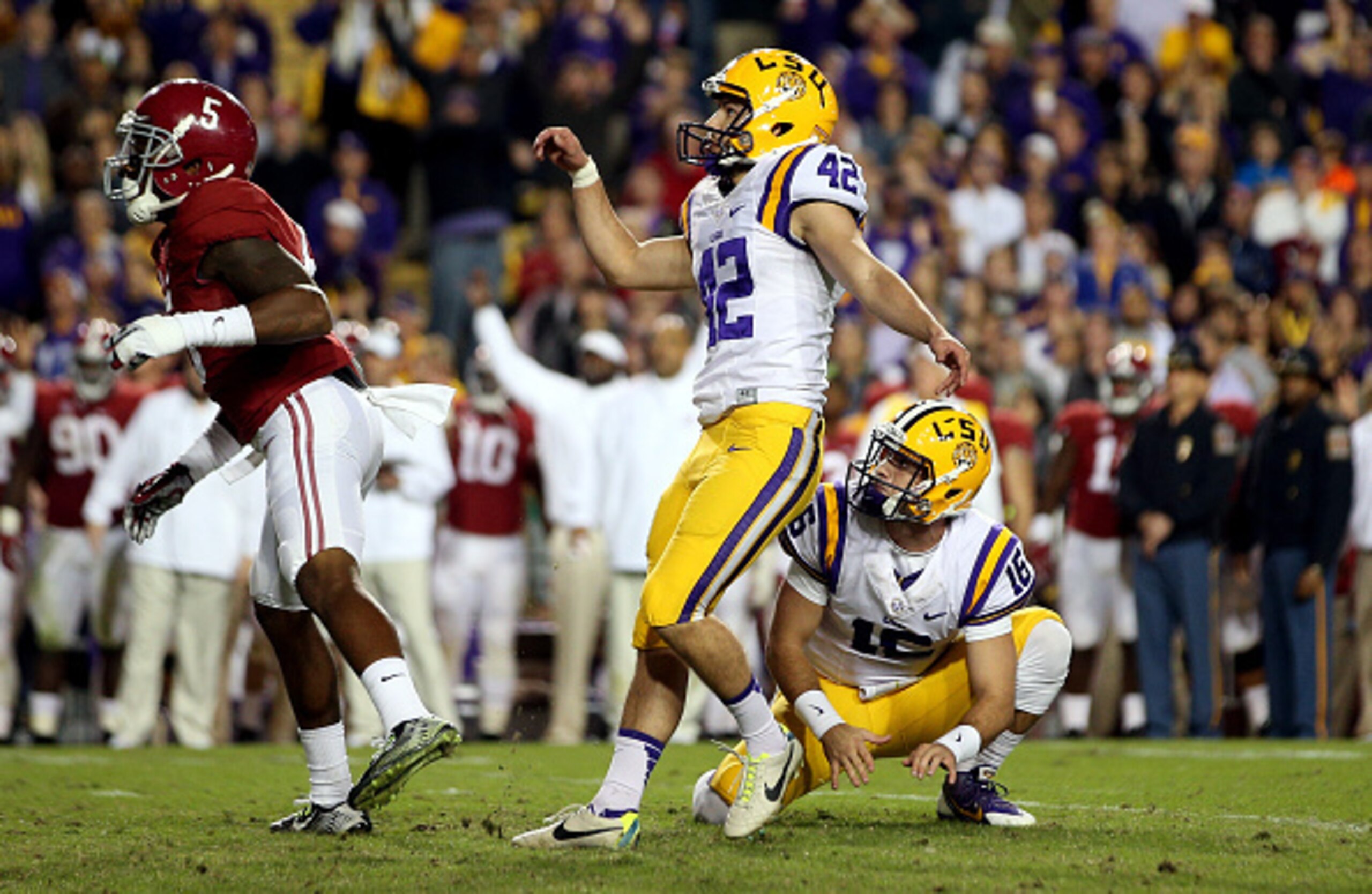 LSU kicker Colby Delahoussaye (No. 42) and holder Brad Kragthorpe (No. 16)