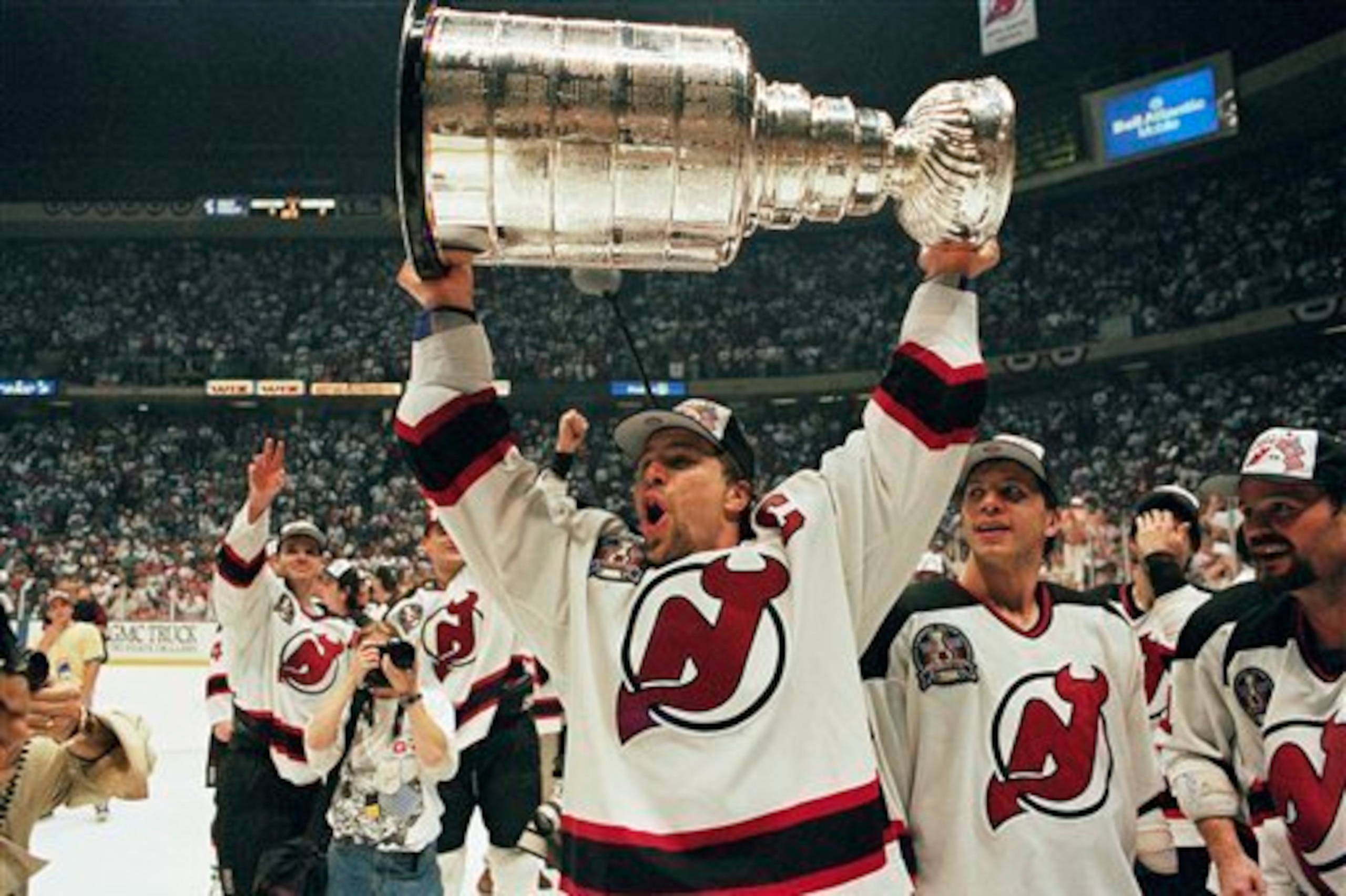 New Jersey Devils captain Scott Stevens celebrates the team's first Stanley Cup victory in 1995.