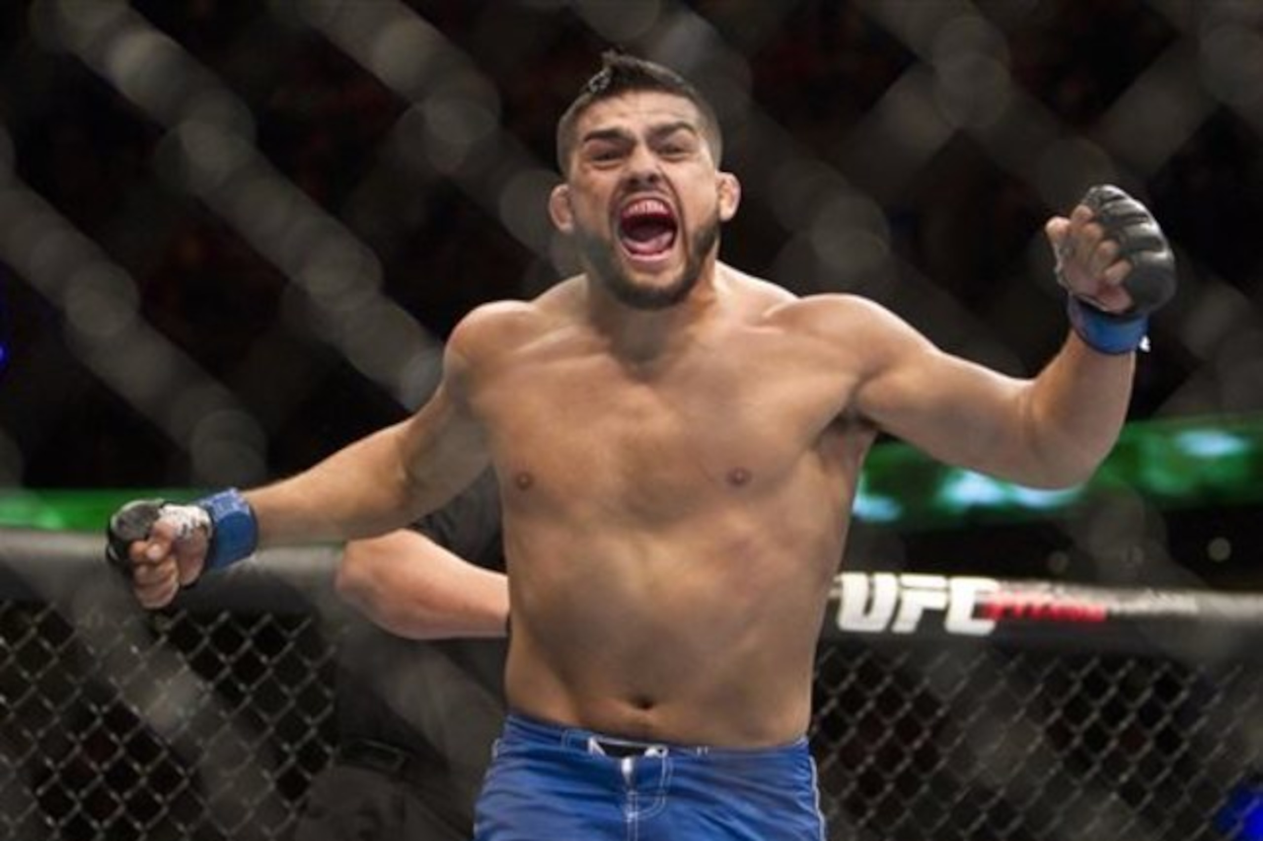 Kelvin Gastelum celebrates after his big win at UFC 180.