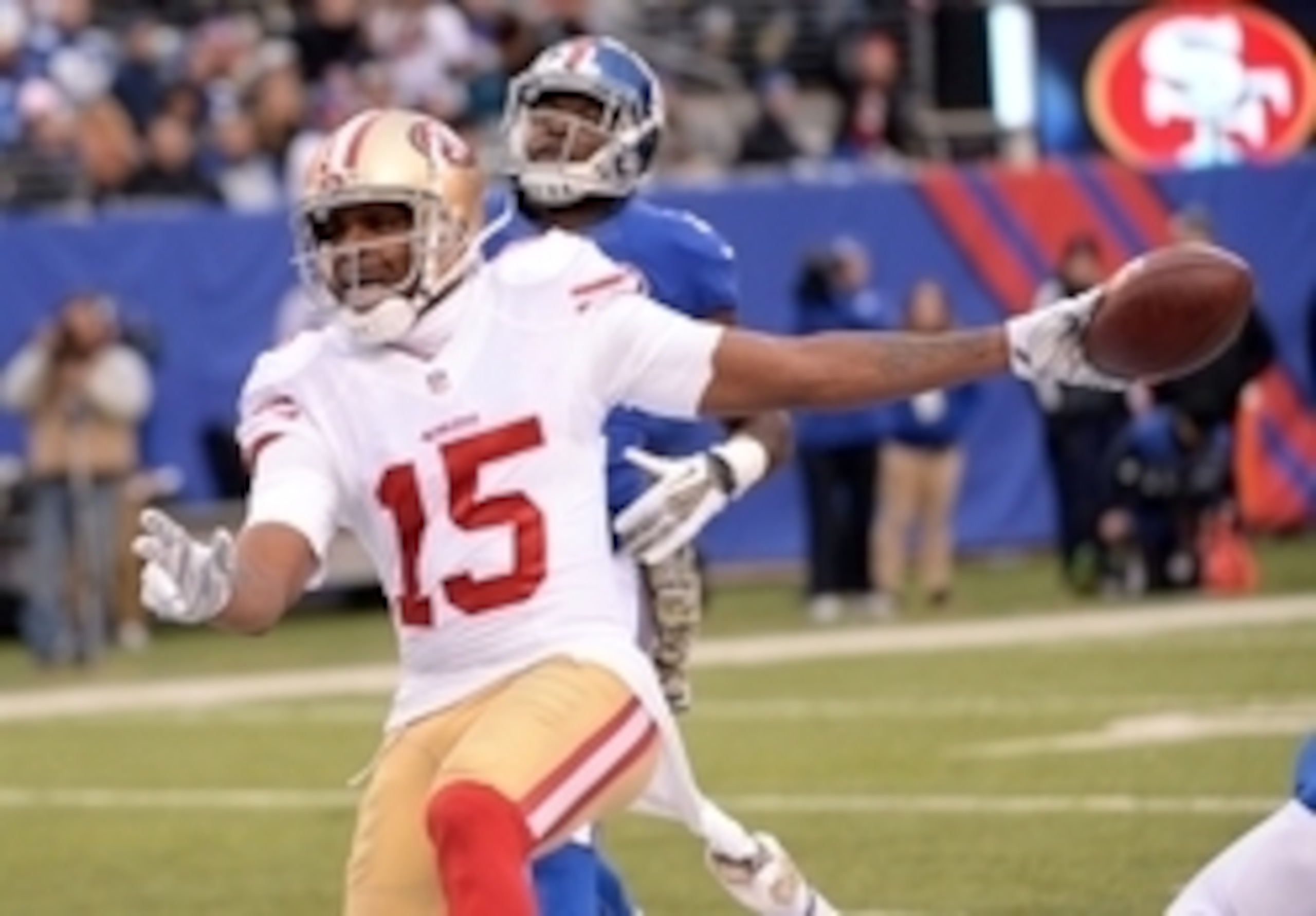 Nov 16, 2014; East Rutherford, NJ, USA; San Francisco 49ers wide receiver Michael Crabtree (15) scores the game winning touchdown during the second half against the New York Giantsat MetLife Stadium. Mandatory Credit: Robert Deutsch-USA TODAY Sports