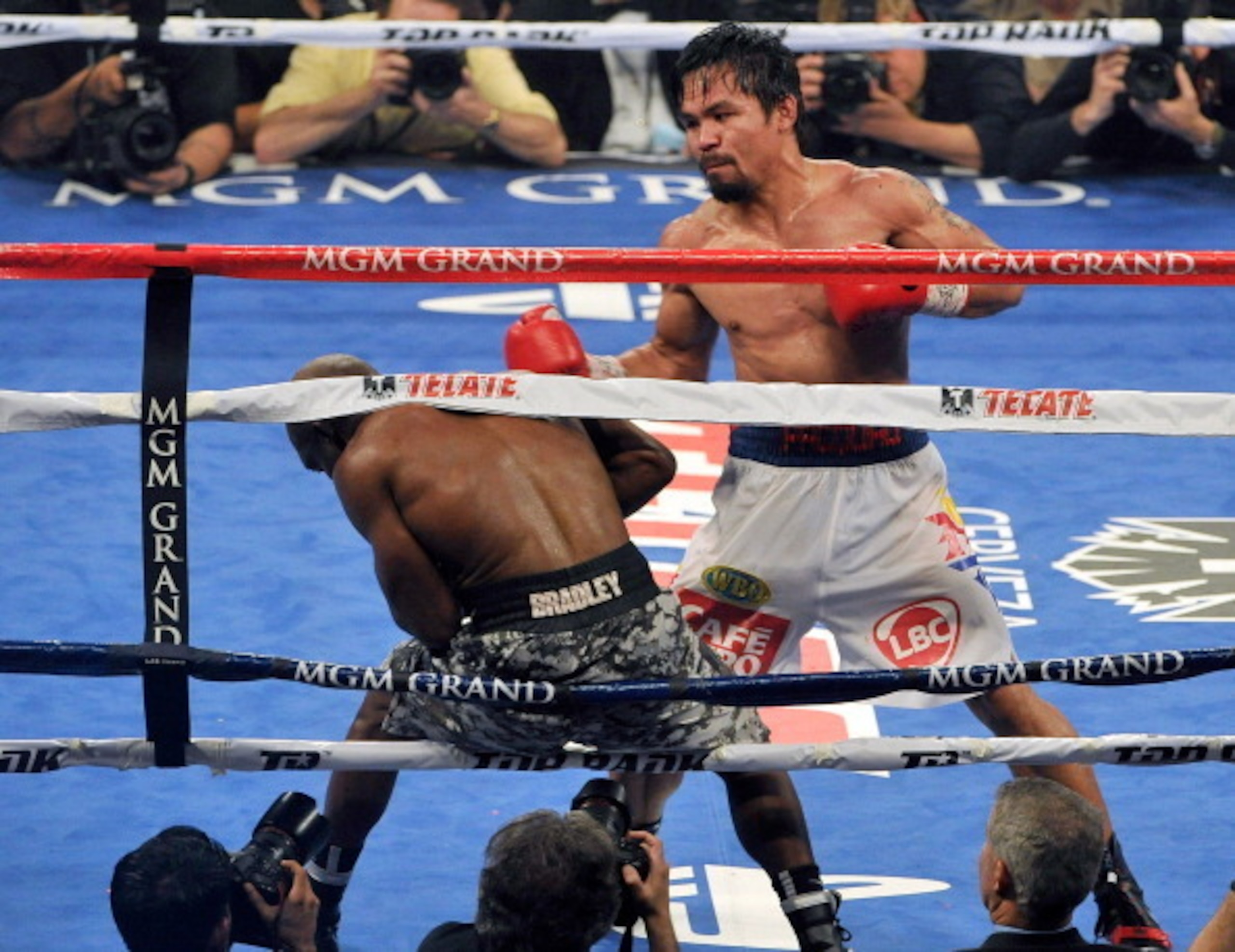 LAS VEGAS, NV - APRIL 12:  Manny Pacquiao (R) pushes Timothy Bradley on the ropes during their WBO world welterweight championship boxing match at the MGM Grand Garden Arena on April 12, 2014 in Las Vegas, Nevada. Pacquiao won by unanimous decision.  (Pho