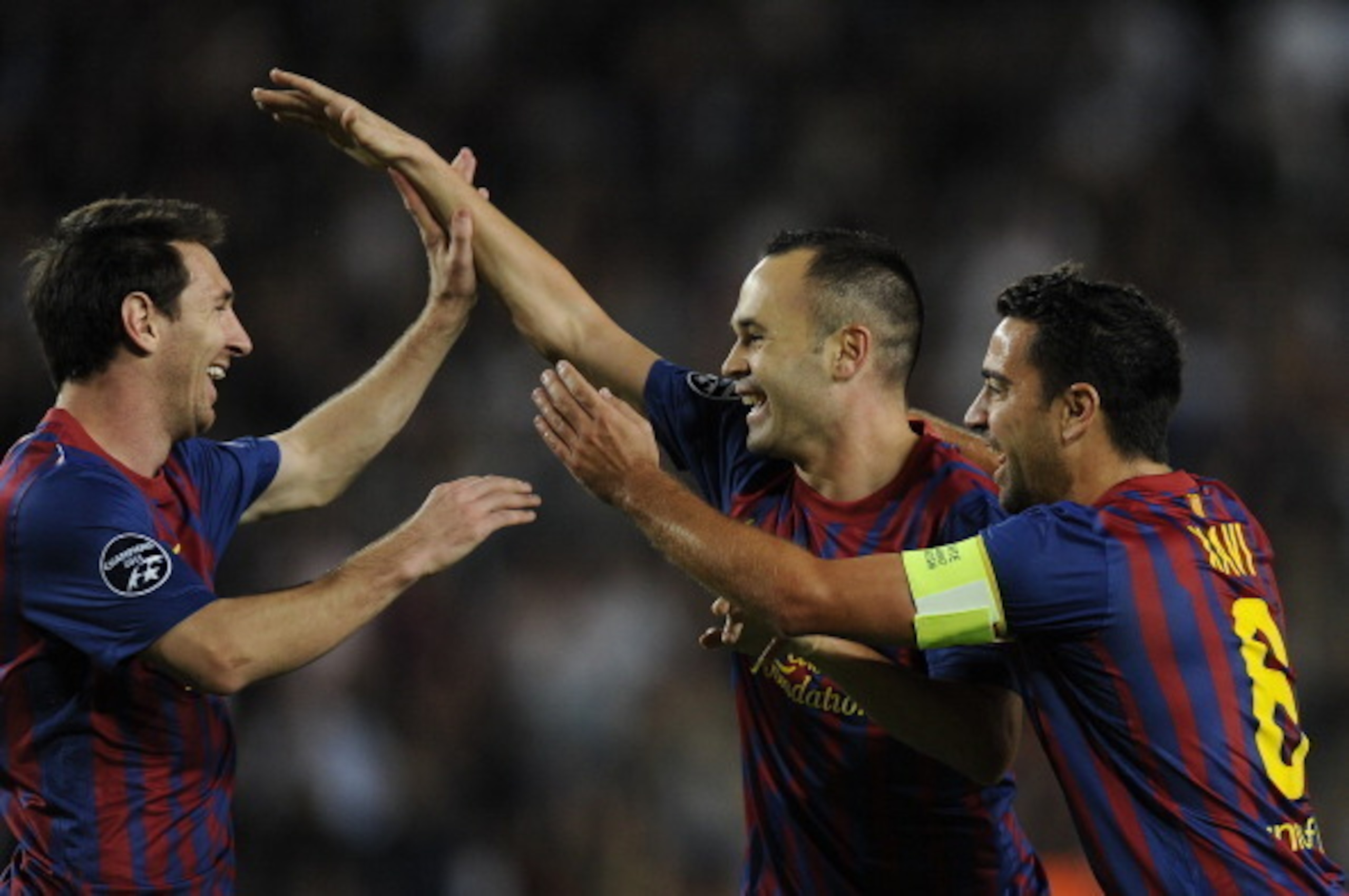 Lionel Messi, Andres Iniesta and Xavi Hernandez. Lionel Messi, Andres Iniesta and Xavi Hernandez.