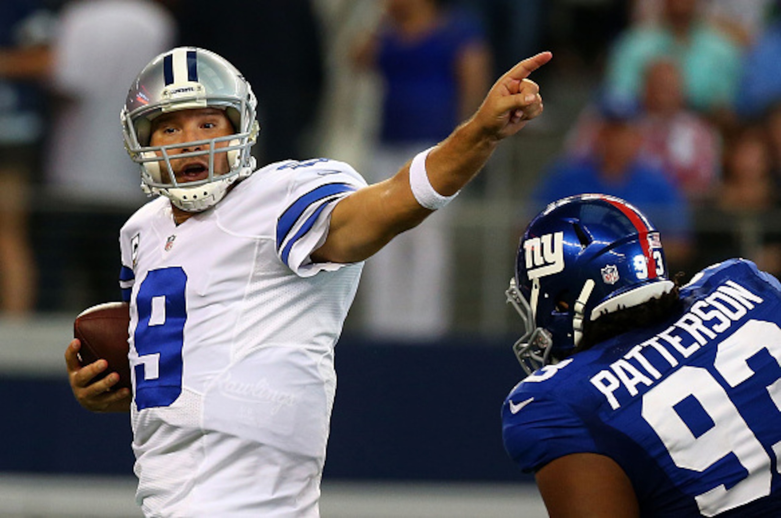 DT Mike Patterson pursues a scrambling Cowboys QB Tony Romo. DT Mike Patterson pursues a scrambling Cowboys QB Tony Romo.