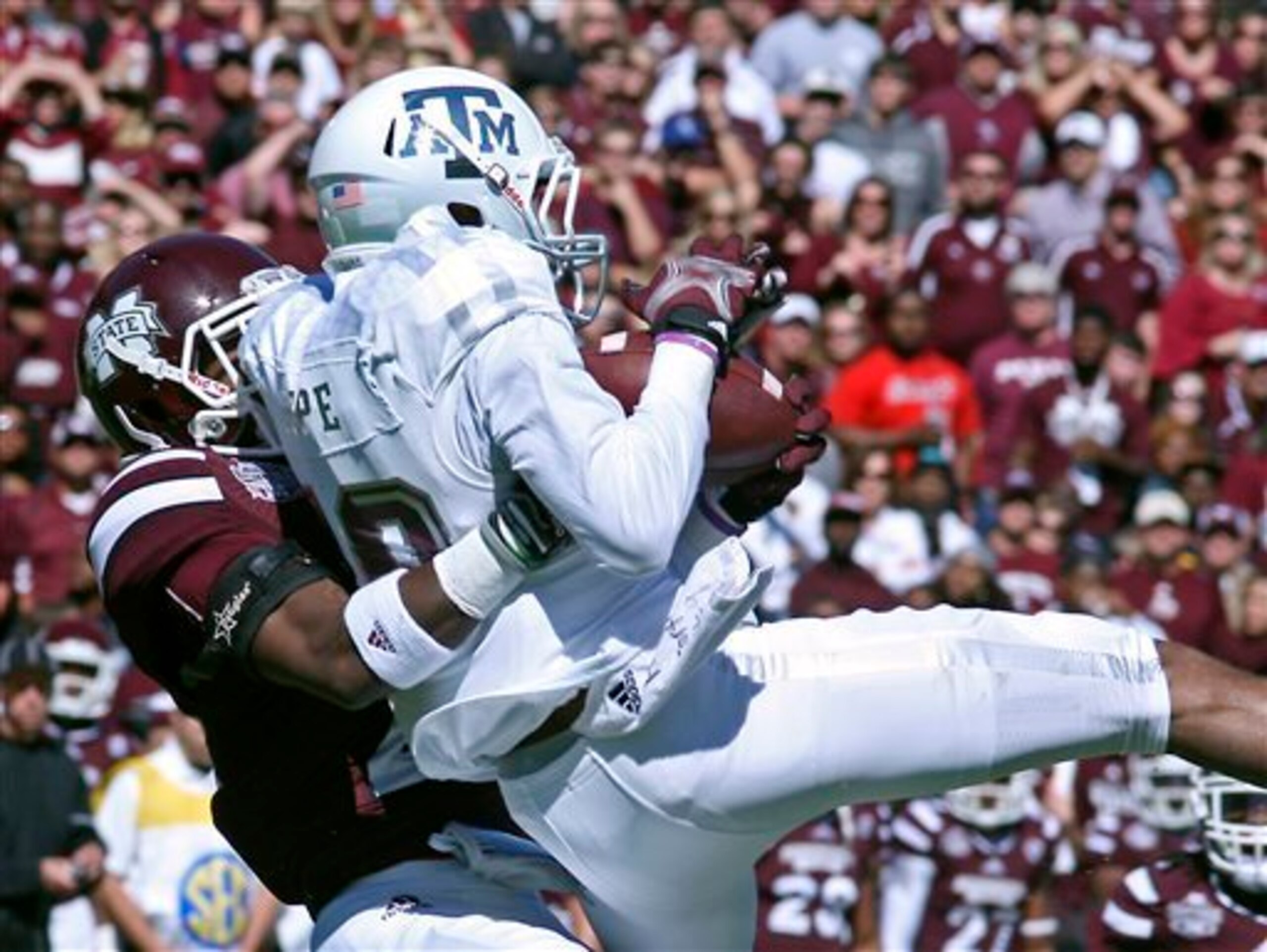 Pope (right) has made big plays for the Aggies.