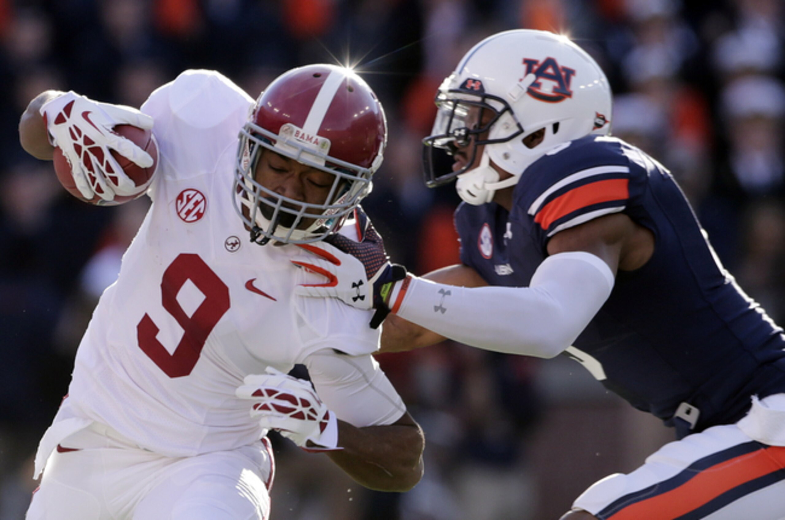 Alabama WR Amari Cooper and Auburn DB Jermaine Whitehead Alabama WR Amari Cooper and Auburn DB Jermaine Whitehead