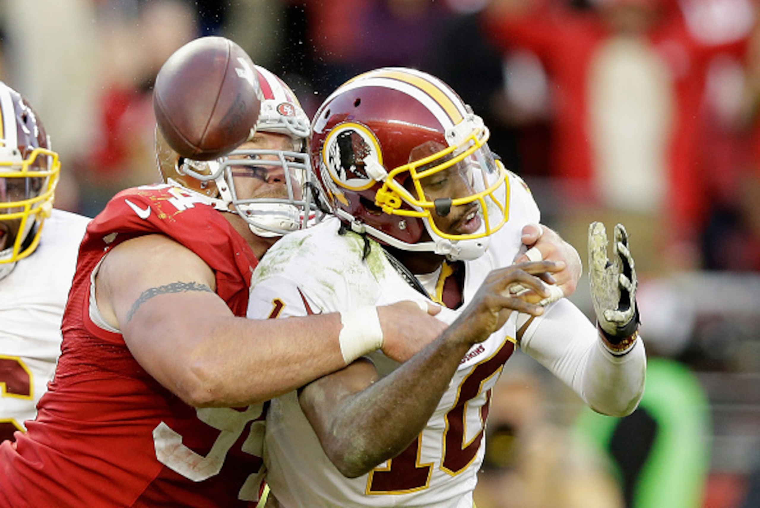 Justin Smith's fourth-quarter sack forced the fumble that sealed the 49ers' victory.