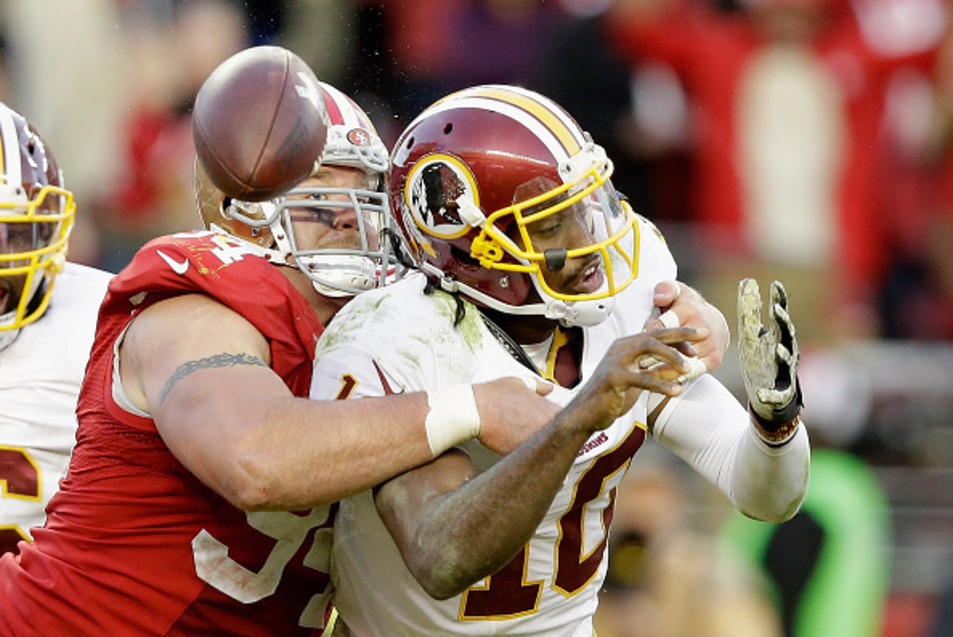Justin Smith's fourth-quarter sack forced the fumble that sealed the 49ers' victory.