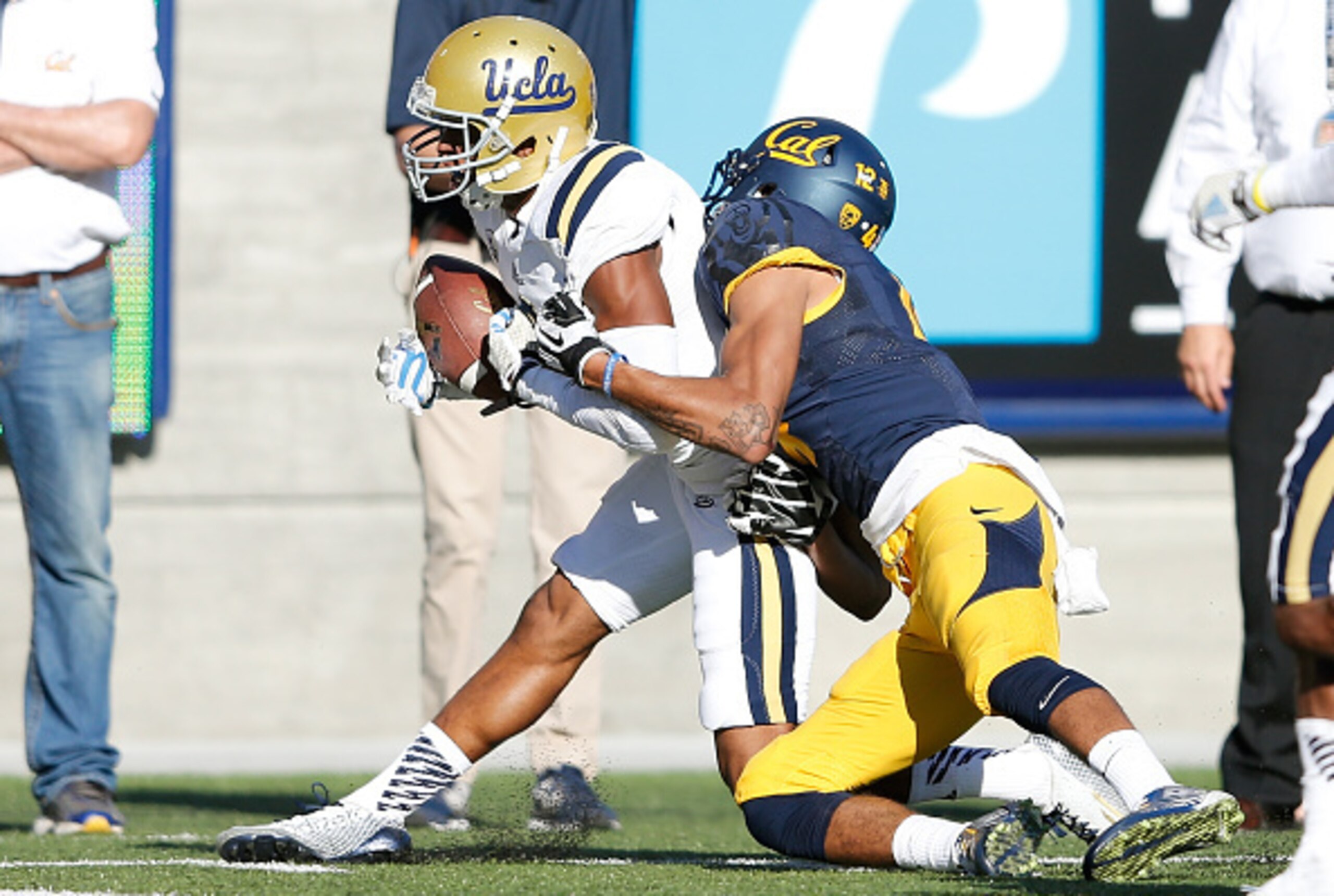 BERKELEY, CA - OCTOBER 18:  Marcus Rios #9 of the UCLA Bruins intercepts this pass intended for Kenny Lawler #4 of the California Golden Bears late in the fourth quarter at Kabam Field at California Memorial Stadium on October 18, 2014 in Berkeley, Califo