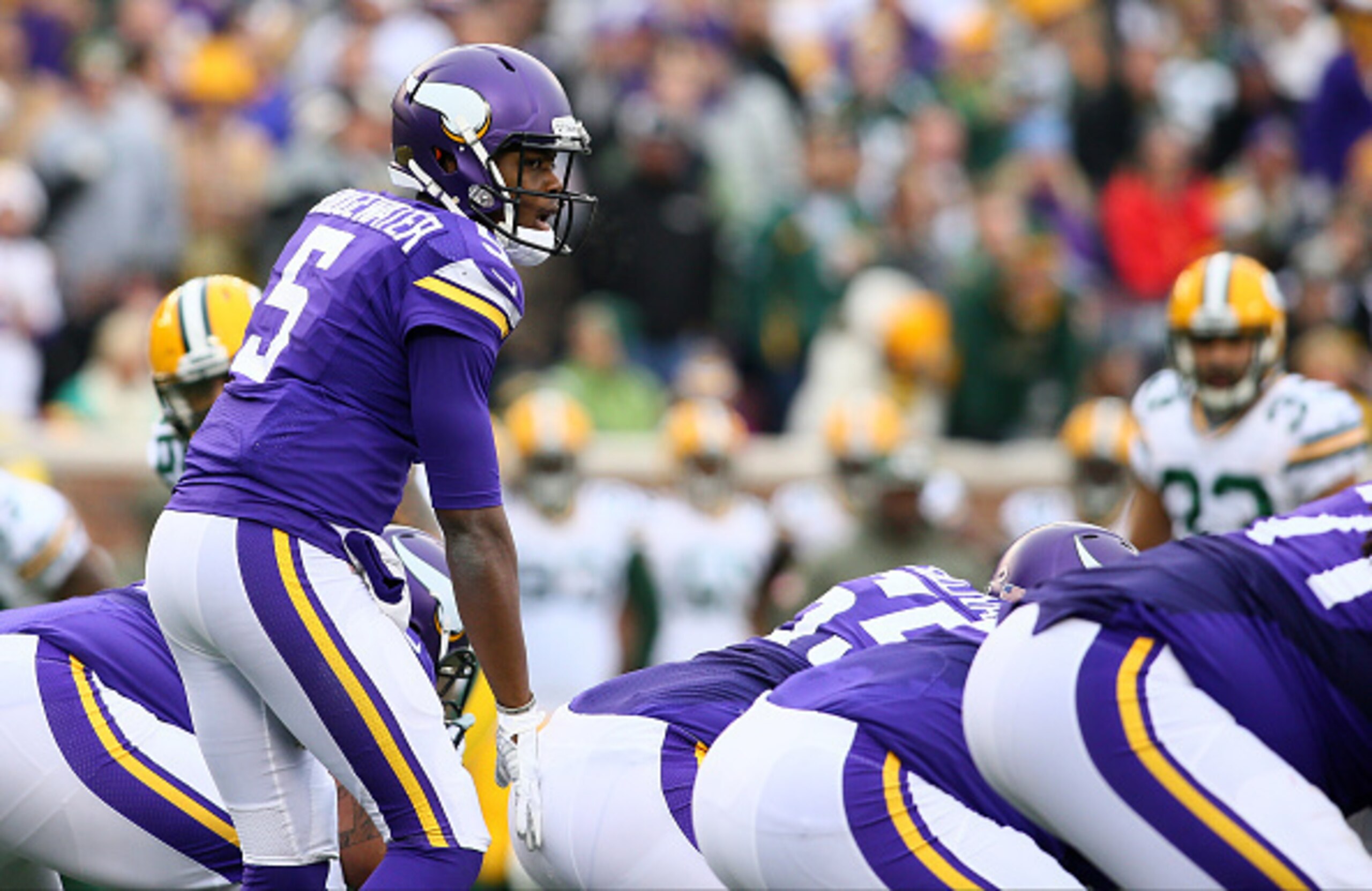 MINNEAPOLIS, MN - NOVEMBER 23: Teddy Bridgewater #5 of the Minnesota Vikings on the line in the second quarter against the Green Bay Packers on November 23, 2014 at TCF Bank Stadium in Minneapolis, Minnesota. (Photo by Adam Bettcher/Getty Images)