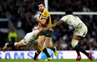 Courtney Lawes (right) lines up Adam Ashley-Cooper for another hit.