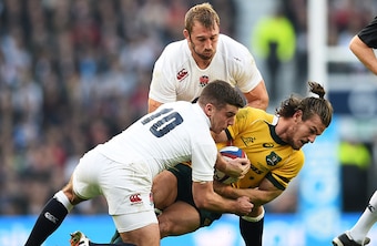 George Ford (10) tackles Australia's lively winger Rob Horne